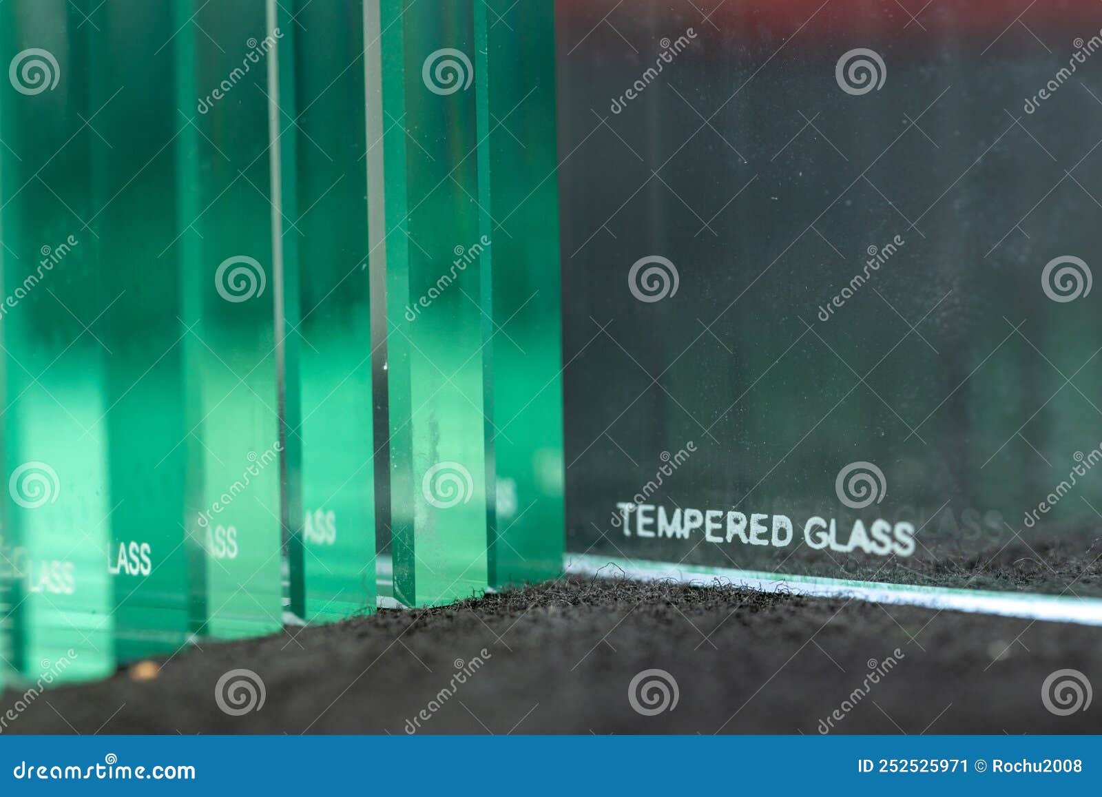 tempered glass, inscription burned on thick glass to protect the material from breaking, construction industry