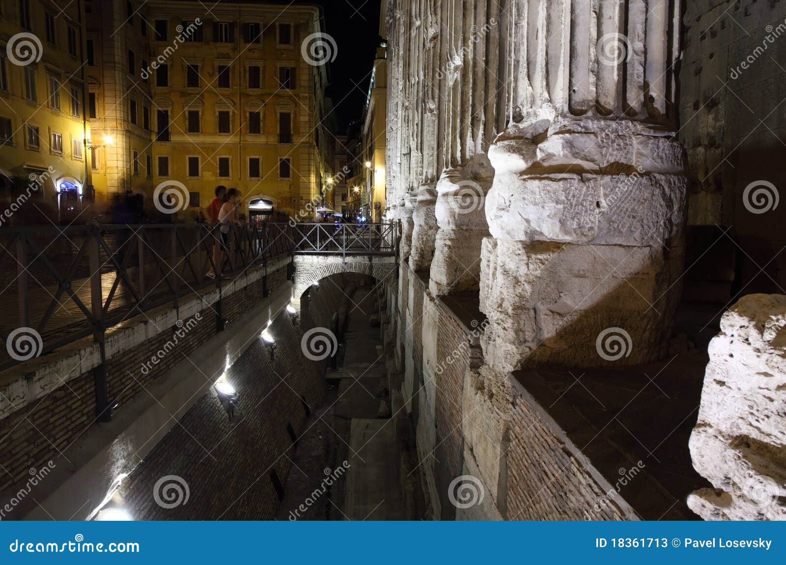 tempio di adriano on piazza di san petro at night