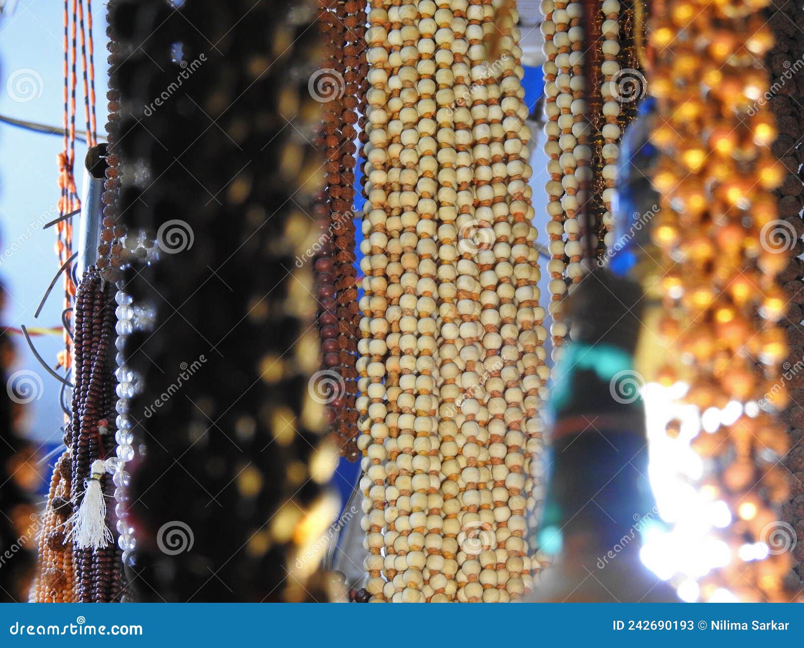 temple shops colorful beaded dhaga string with rudrakhs in display