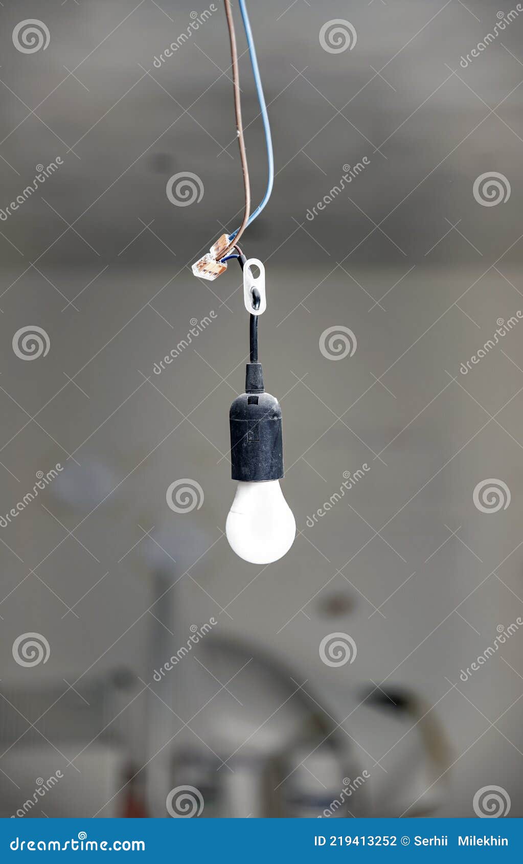 Temporary Light at Construction Site, Hanging from the Ceiling. Construction Site Background