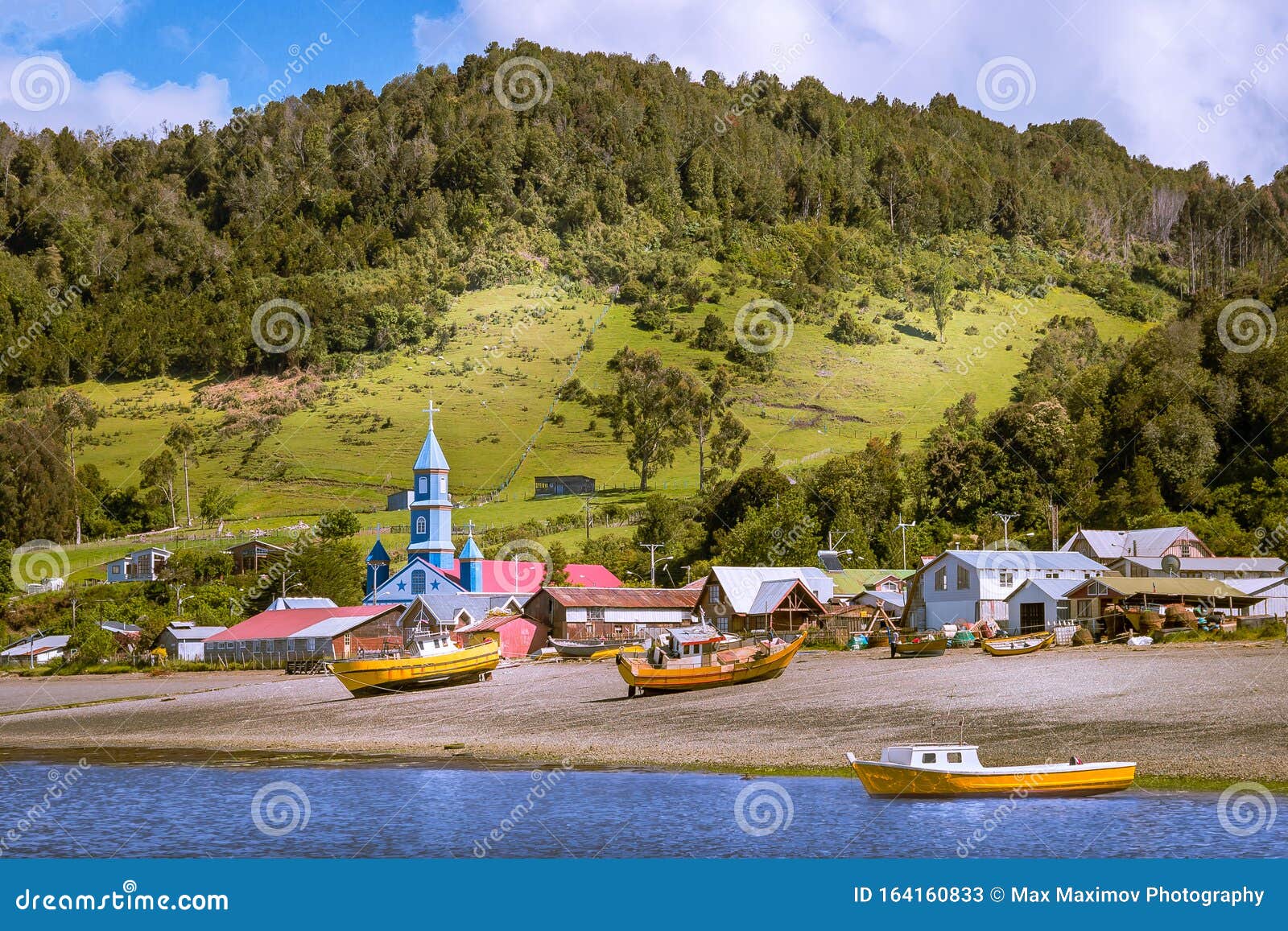 tenaun, chiloe archipelago, chile - view of the town of tenaun and its wooden jesuit church