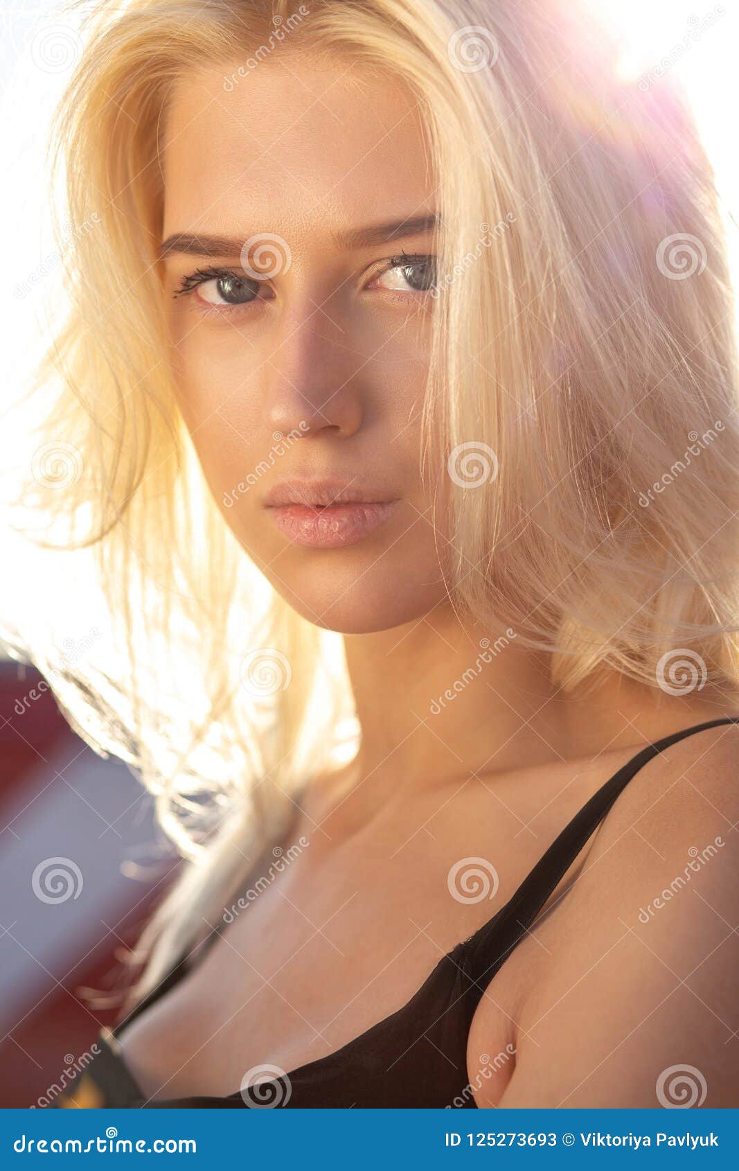 Tender Blonde Blue Eyed Model With Natural Makeup And Hair Look