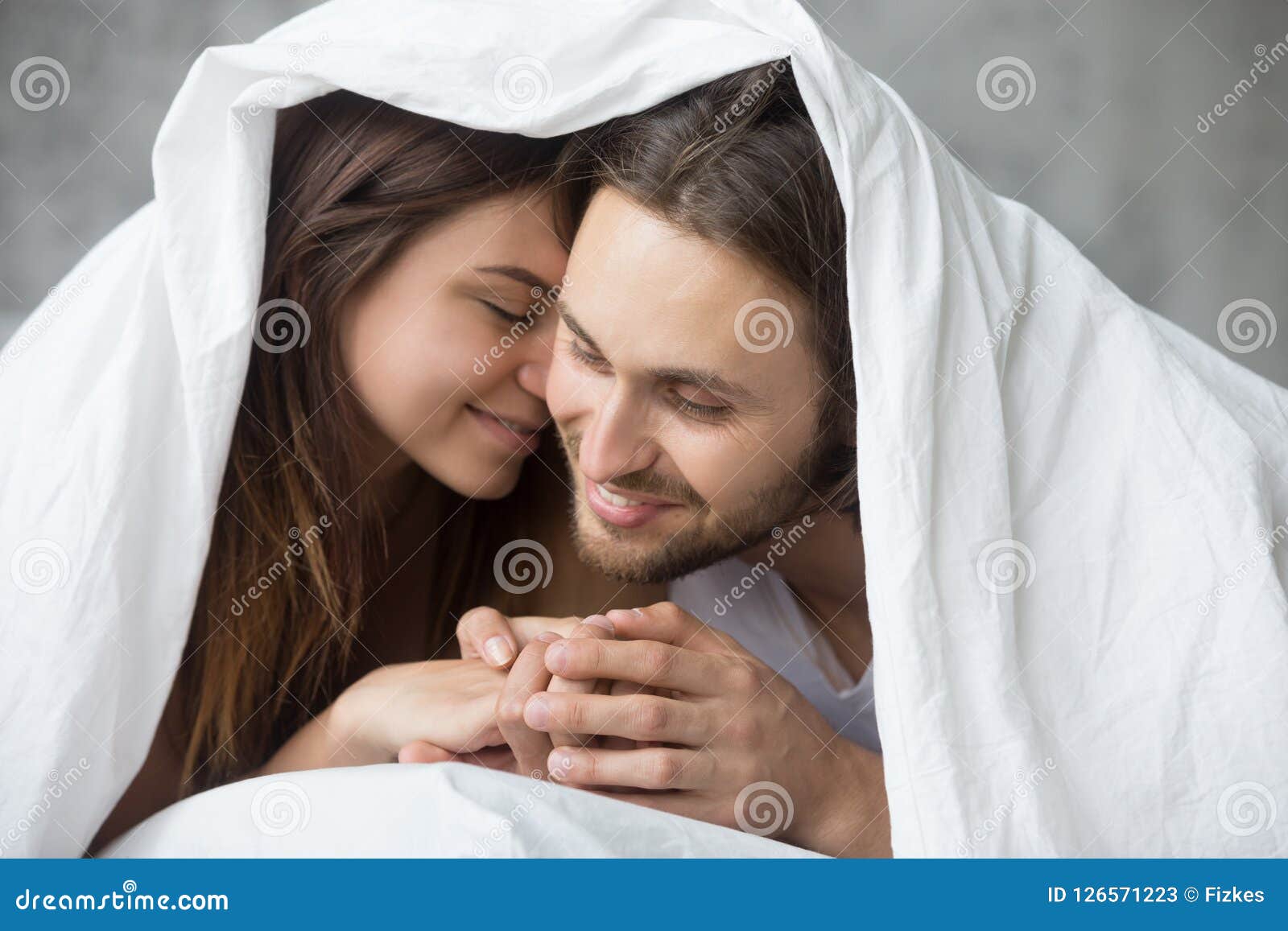 Tender Couple Relaxing Under Blanket On Sunday Morning In Bed Stock Image Image Of Duvet