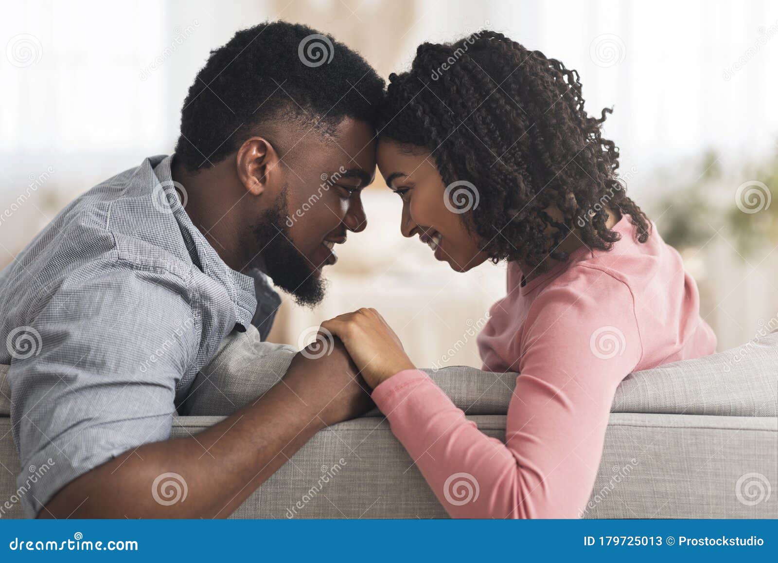 Romantic Black Couple Bonding At Home Holding Hands And Touching Foreheads Stock Image Image