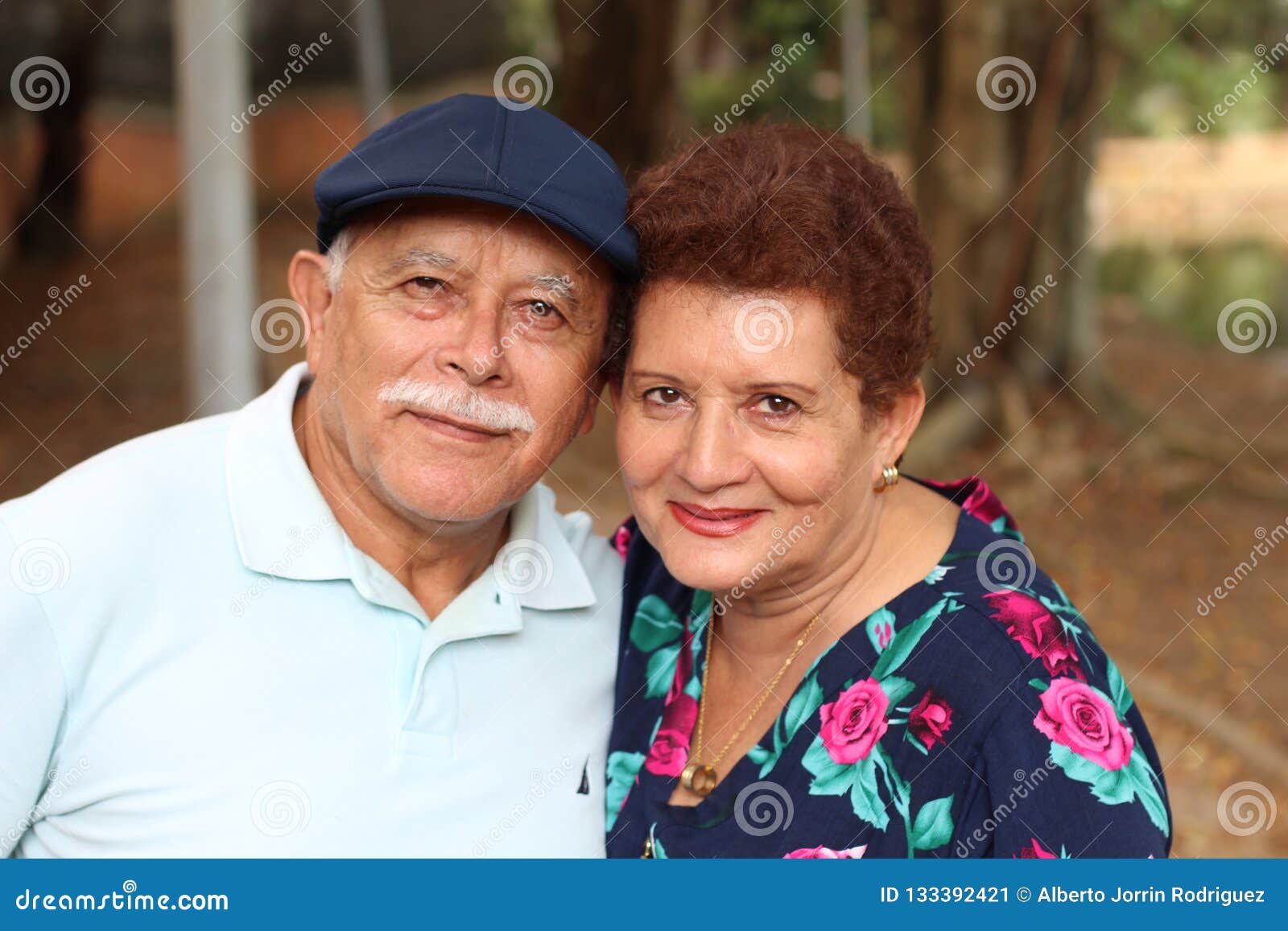 tender older ethnic couple candid
