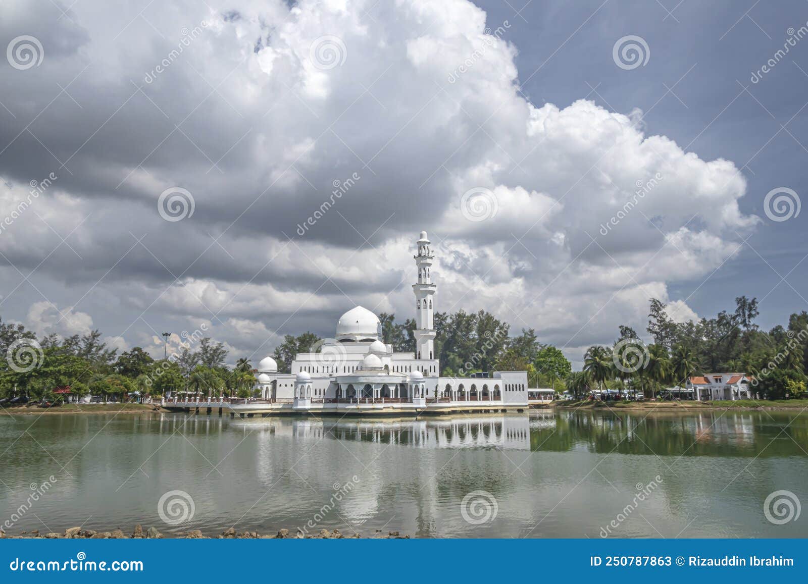 kuala ibai floating mosque or masjid tengu tengah zaharah and its reflection in the water.