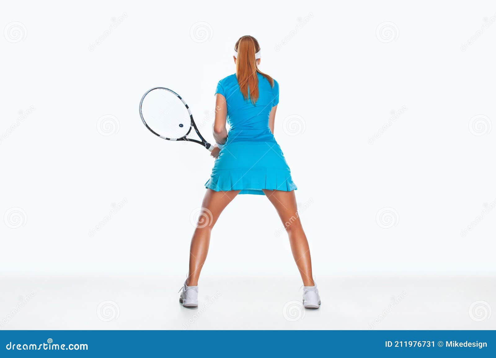 Tenista Con Raqueta De Traje Azul. Mujer Atleta Jugando Aislada En El ...