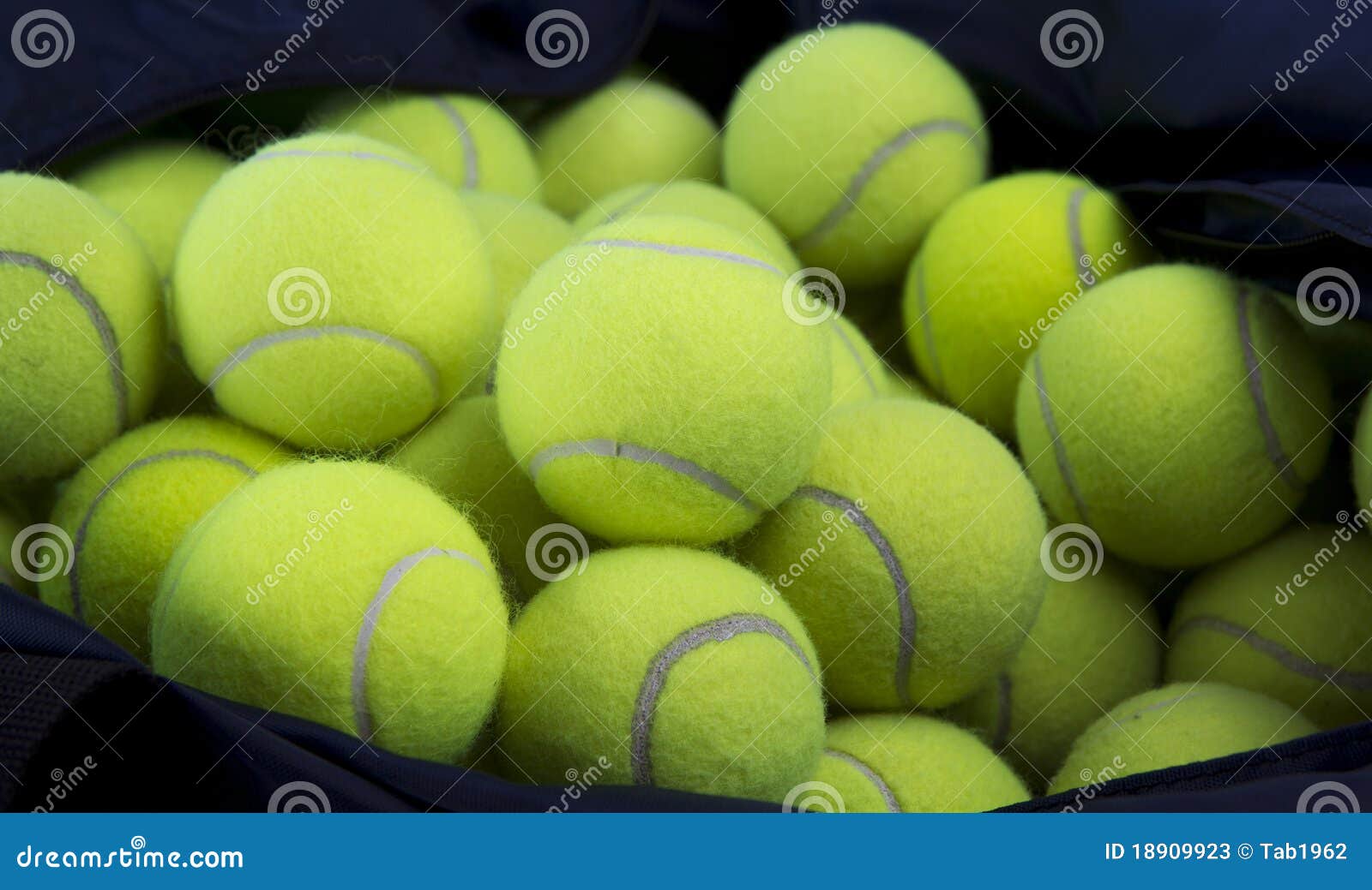 Tennis balls and carry bag stock image. Image of equipment 18909923