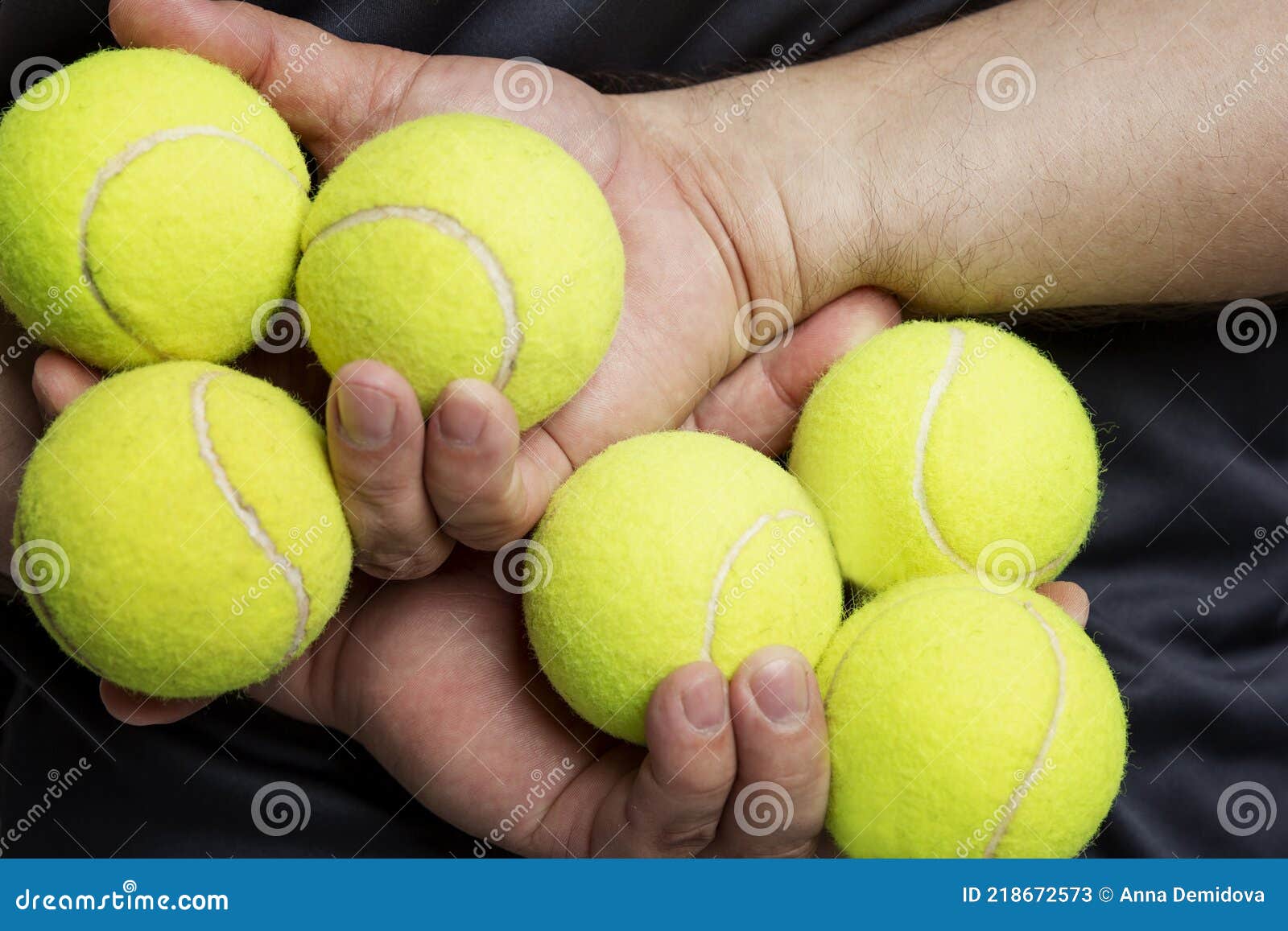 Tennis Balls in Men`s Hands. Back View Stock Image Image of
