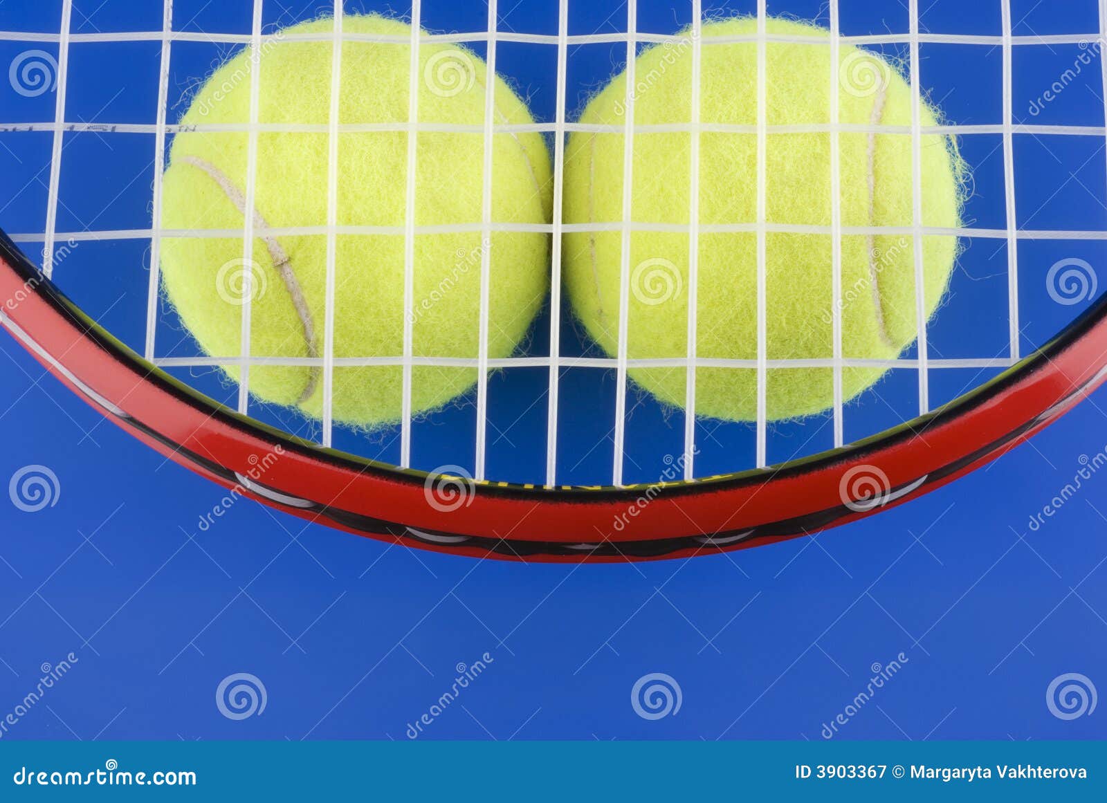 Tennis Balls is Under a Tennis Racket on a Blue Stock Image Image of