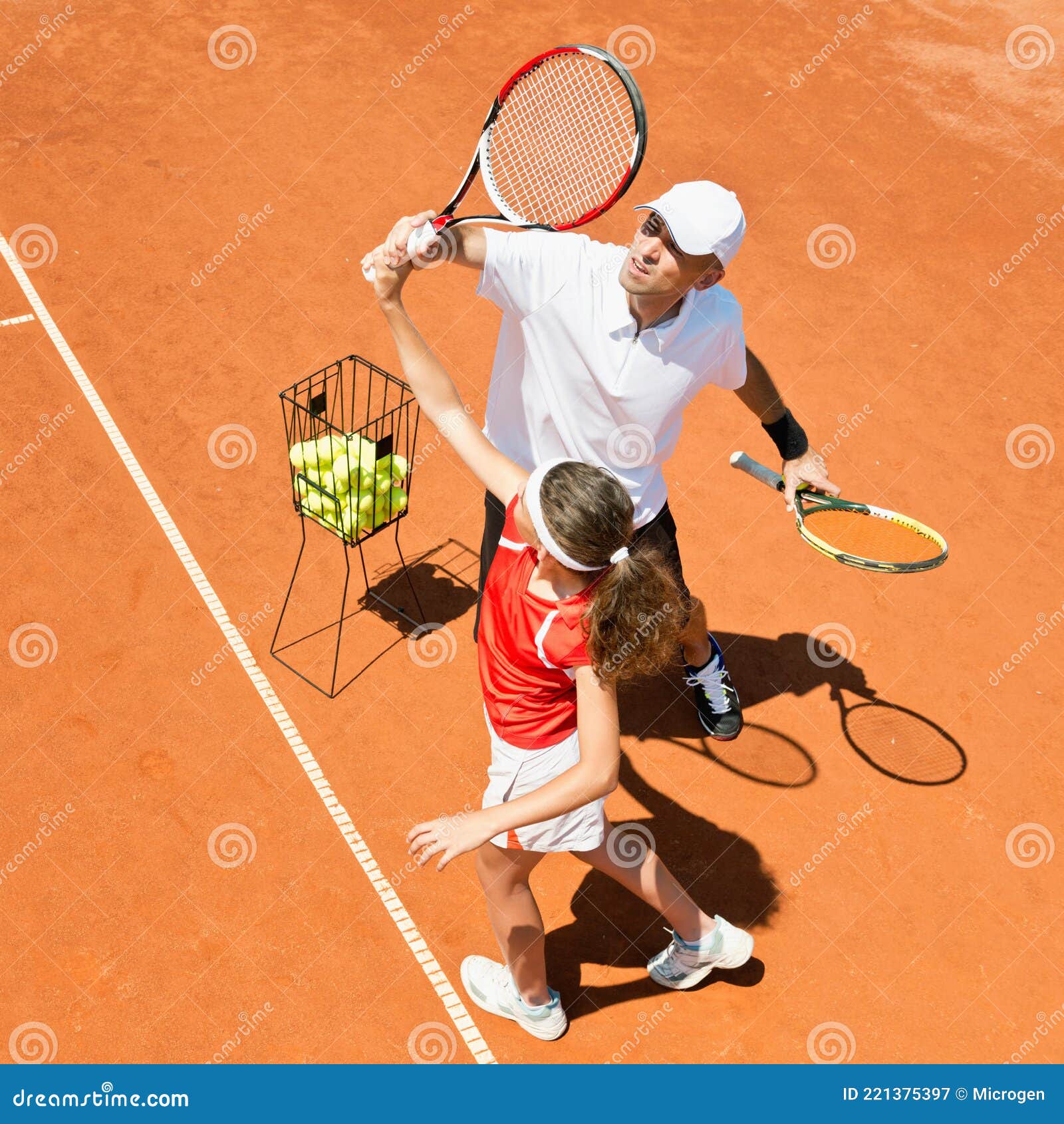 Tennis Coach and Junior Female Tennis Player Stock Image Image of
