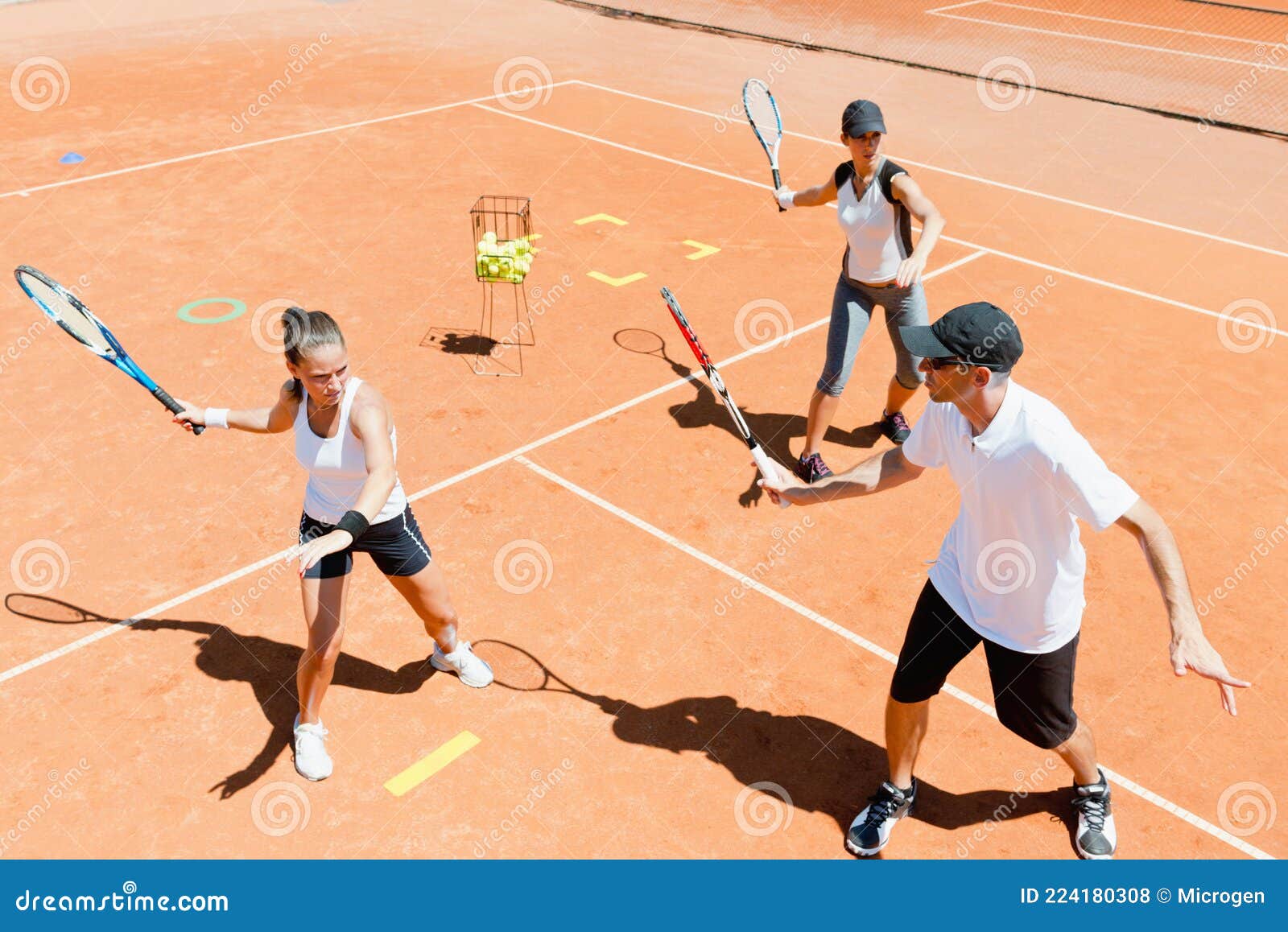 Tennis Instructor Explaining Forehand Stock Photo Image of people