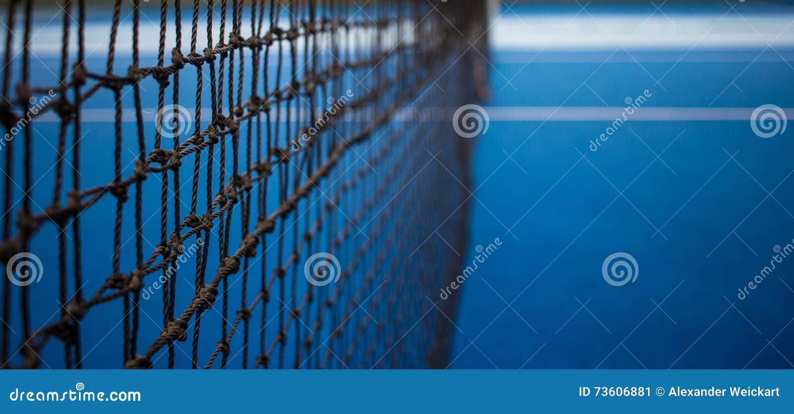 Tennis net and blue court. stock image. Image of ball 73606881