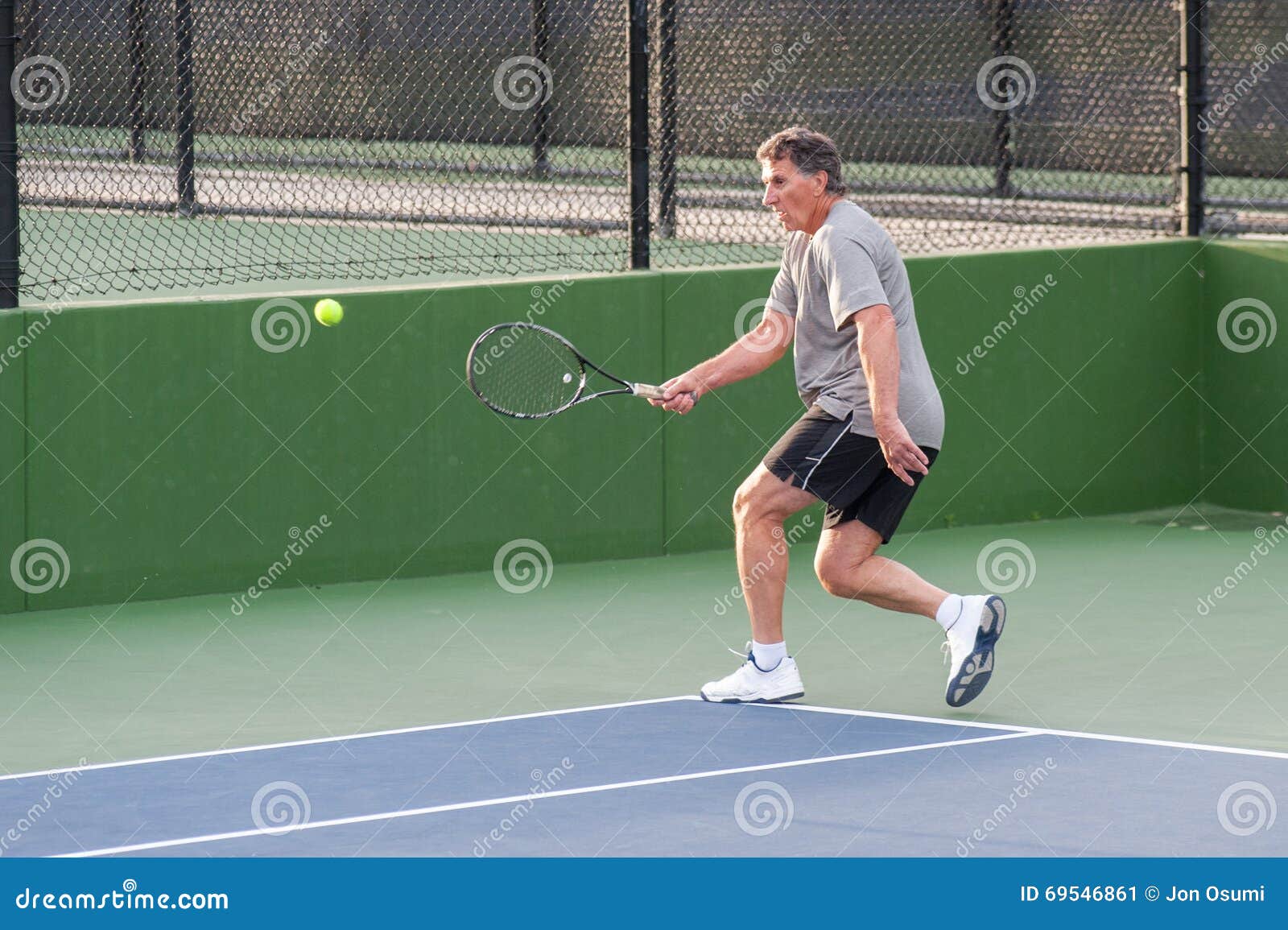US dollar Refrein Banyan Tennis Player Quick in Getting To the Ball. Stock Image - Image of quick,  game: 69546861