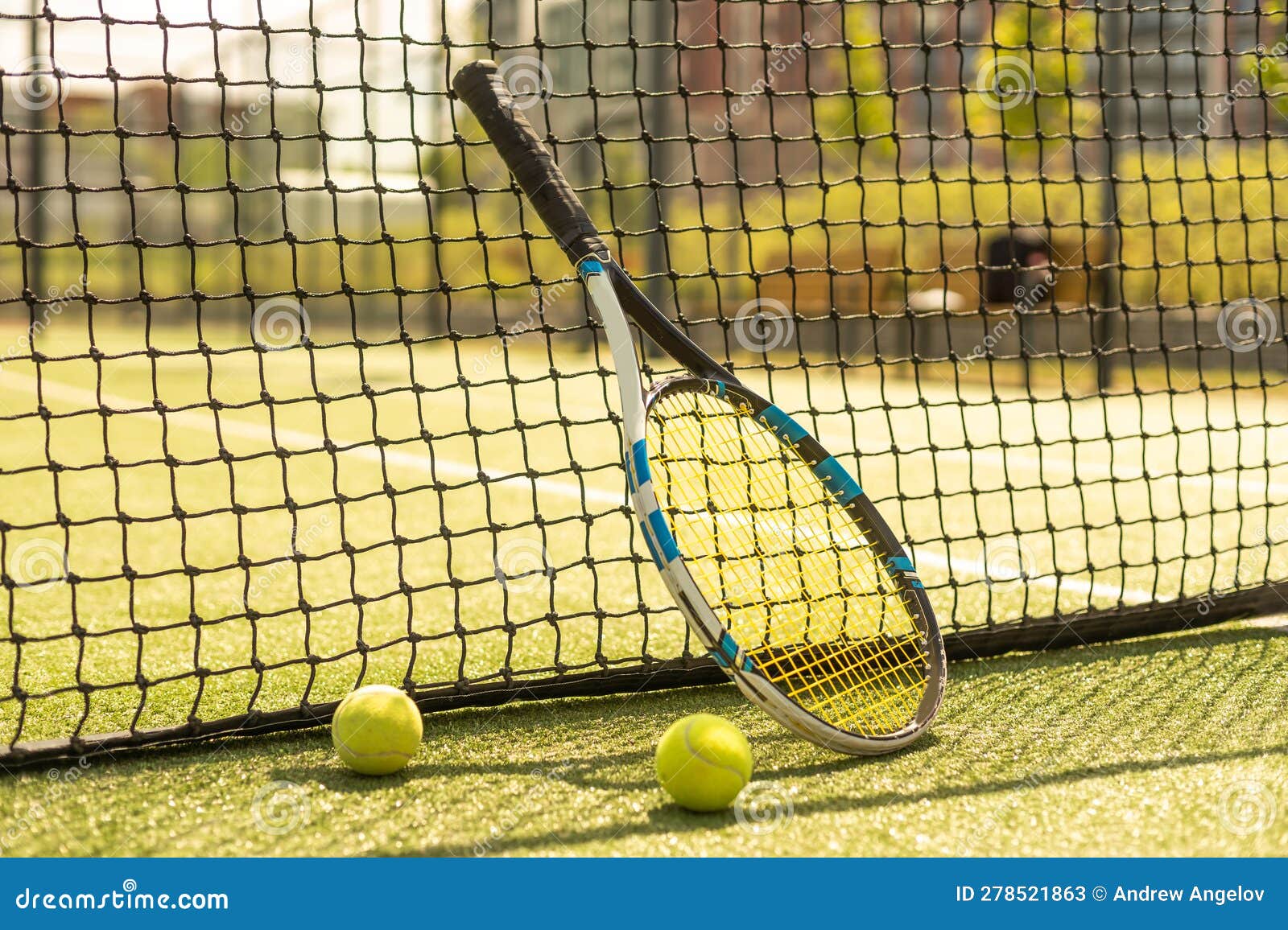 Tennis Racket with a Tennis Ball on a Tennis Court Stock Image Image