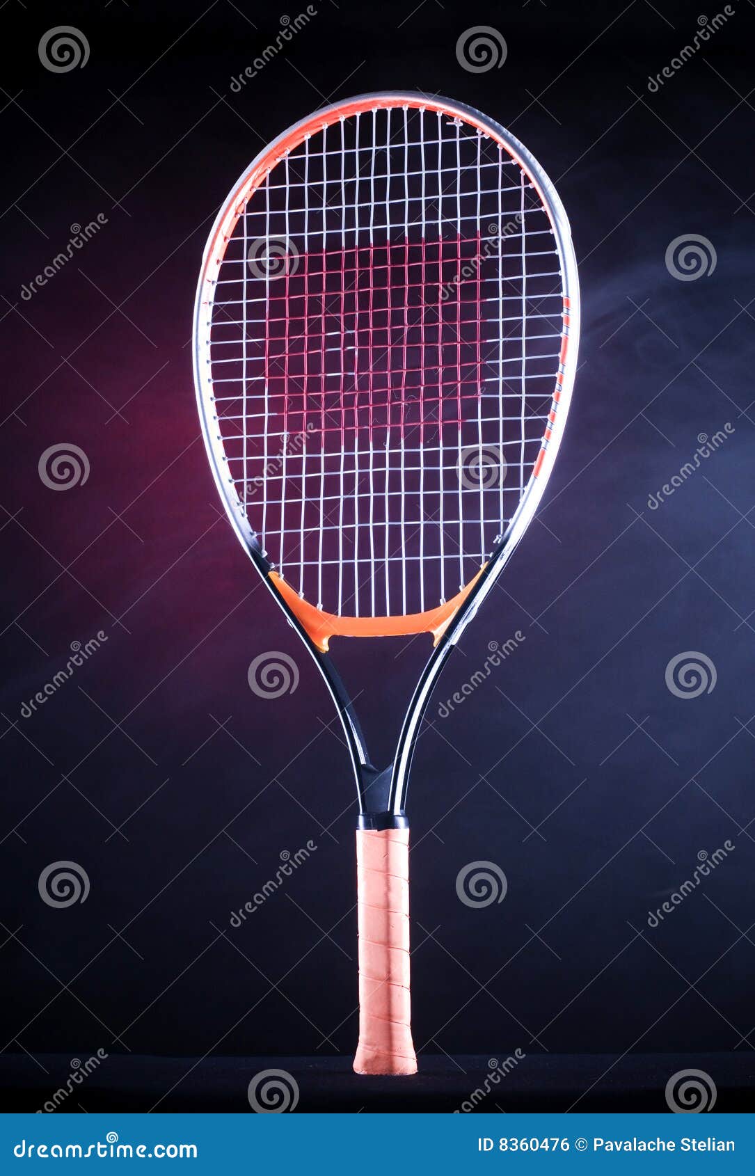 Tennis racquet with red background