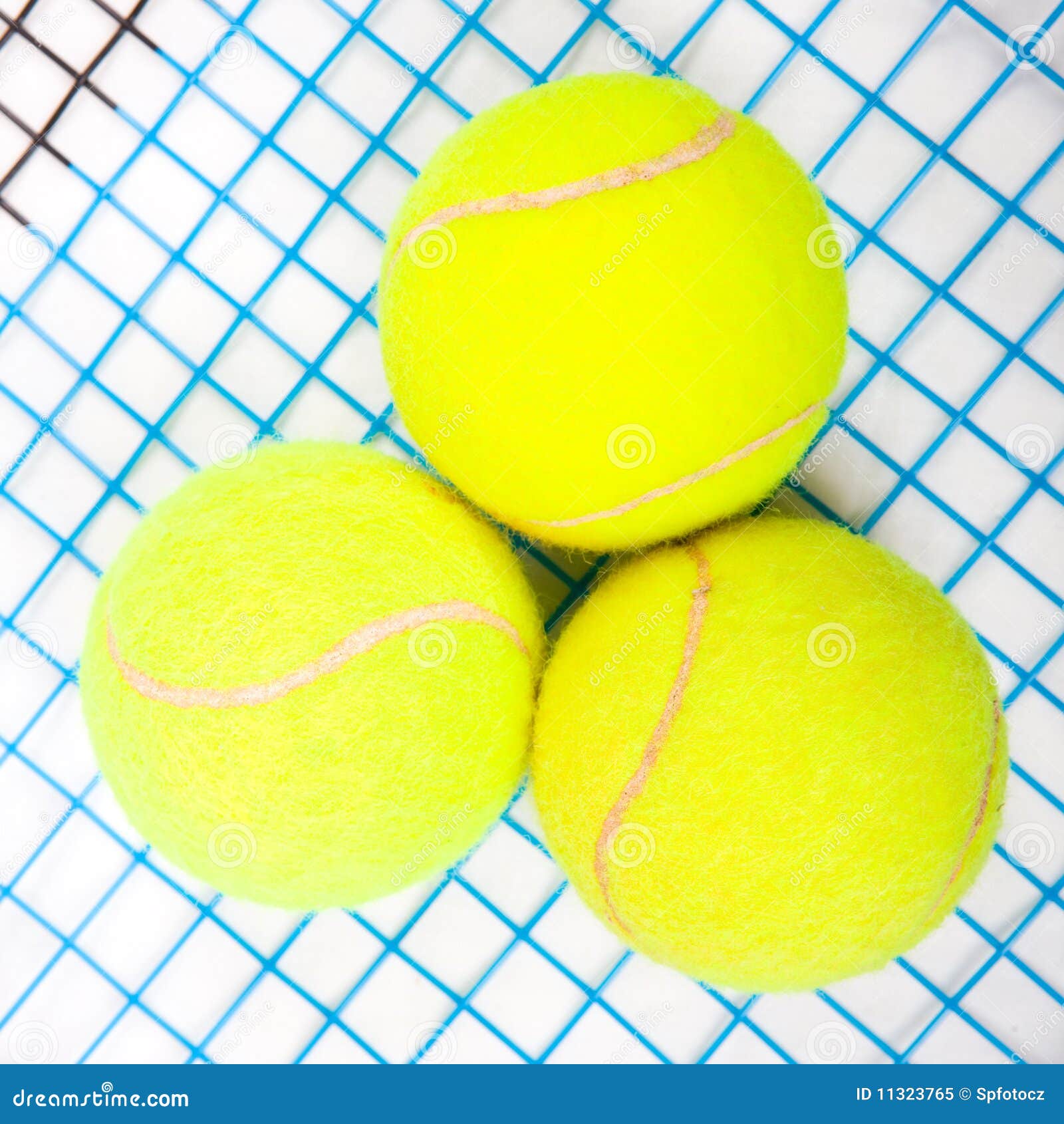 tennis raquet with a tennis balls