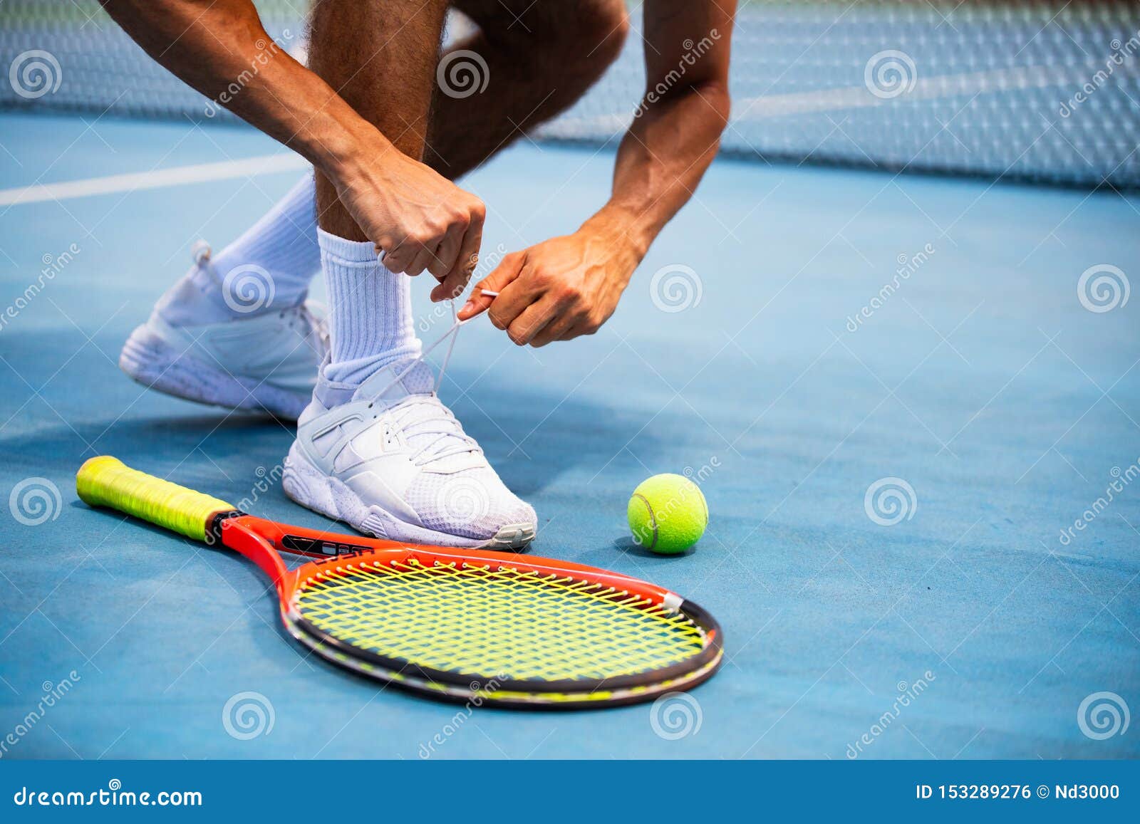 Tennis Athlete Player Getting Ready Tying Shoe Laces during Game on ...