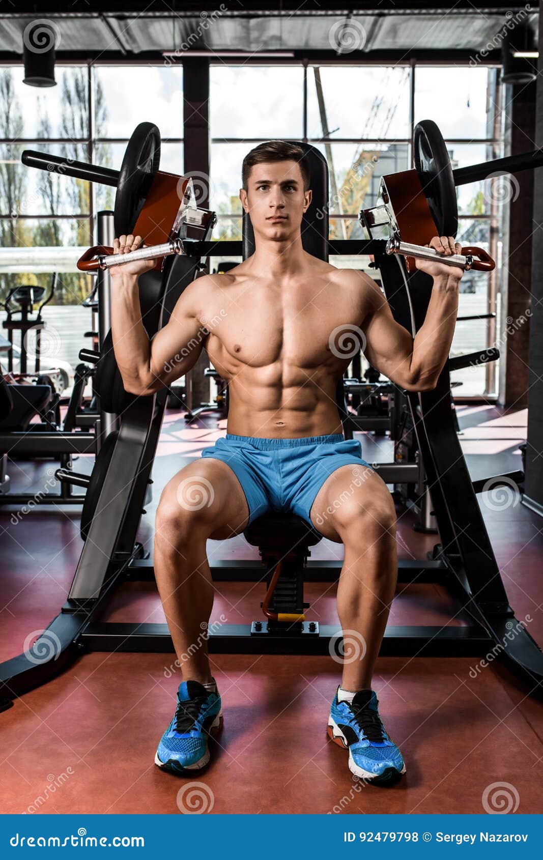 Tense Muscles of Hands Under Load. Man Doing Exercise for Biceps in the
