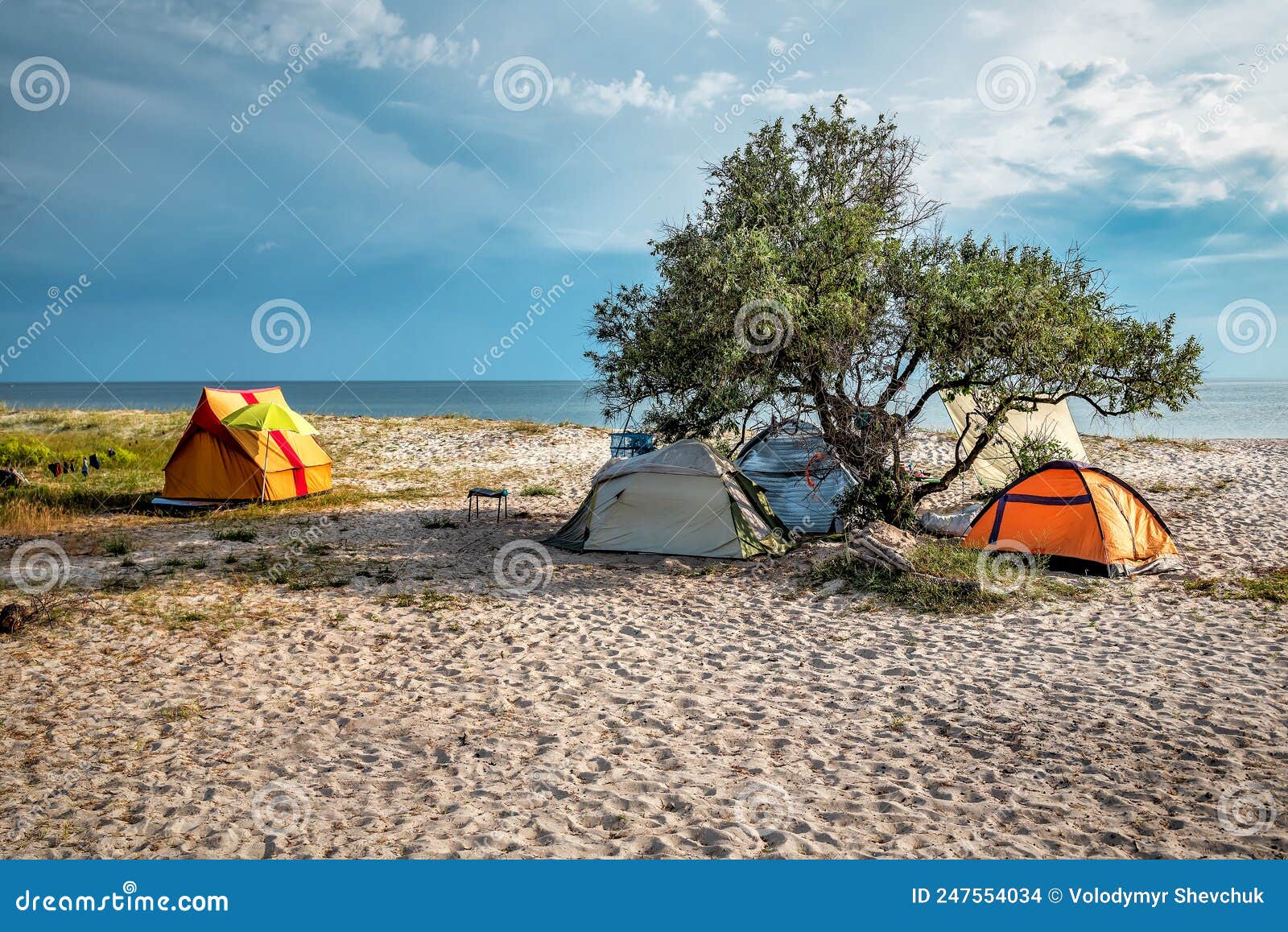 Tent camp on the beach stock photo. Image of leisure 247554034