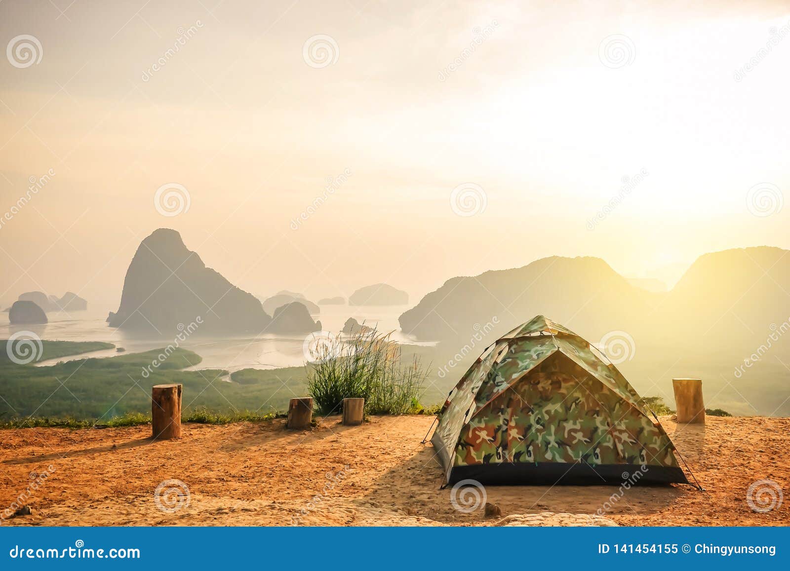 Tent Camping on the High Mountains with Blue Sky in Morning at Samet