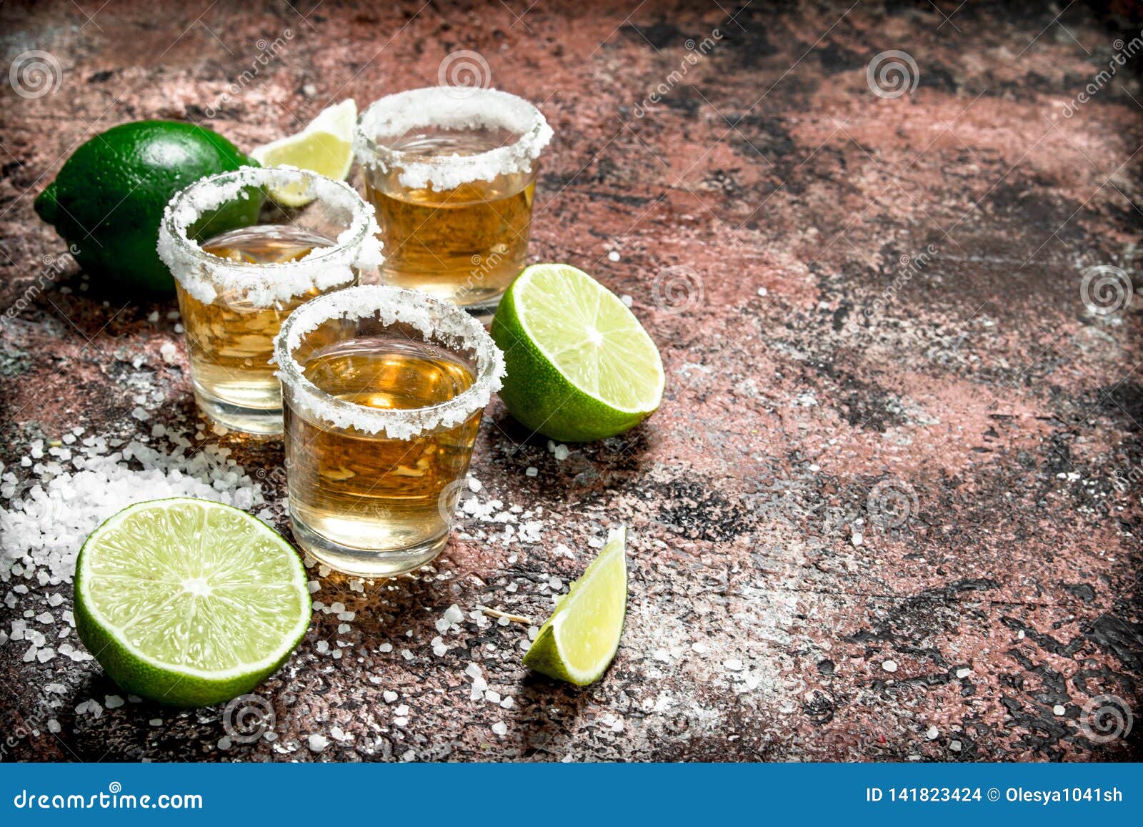 Tequila in a Shot Glass with Salt and Sliced Lime Stock Photo Image
