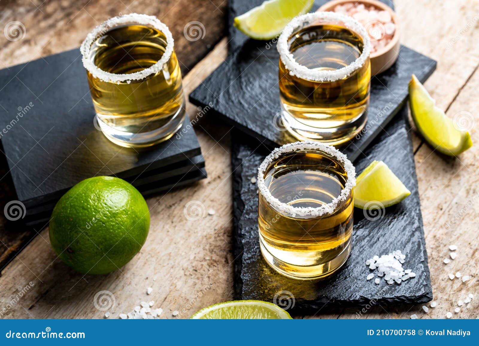 Tequila Shots with Salt and Lime Mexican National Drink. Golden Tequila ...