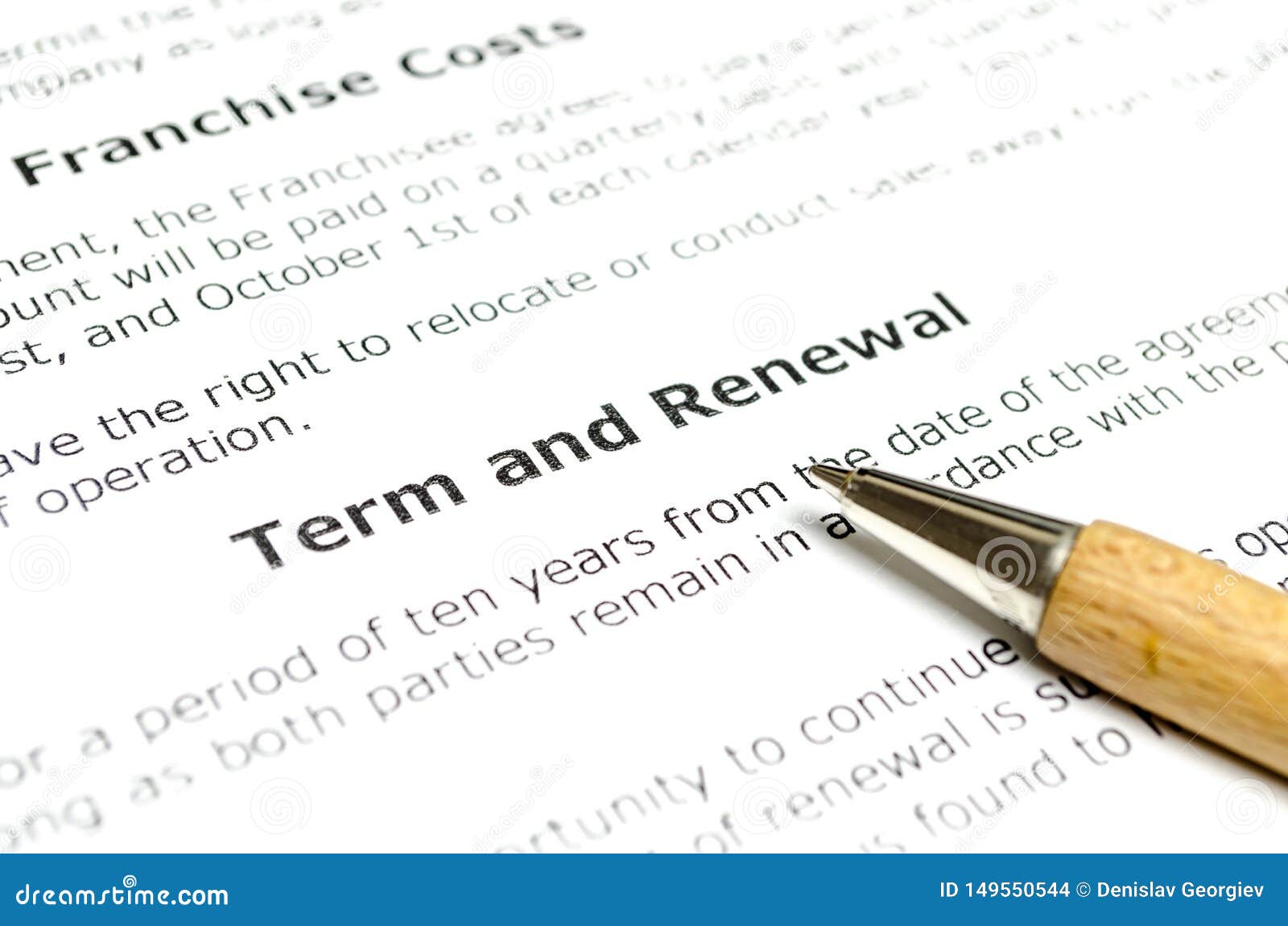 term and renewal with wooden pen