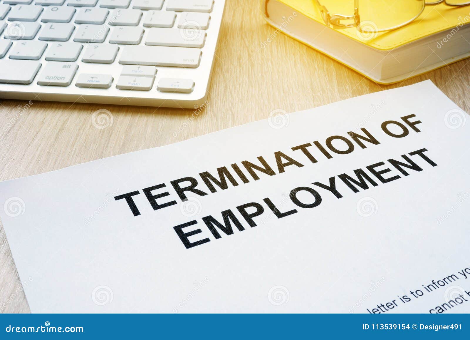 termination of employment on a desk.