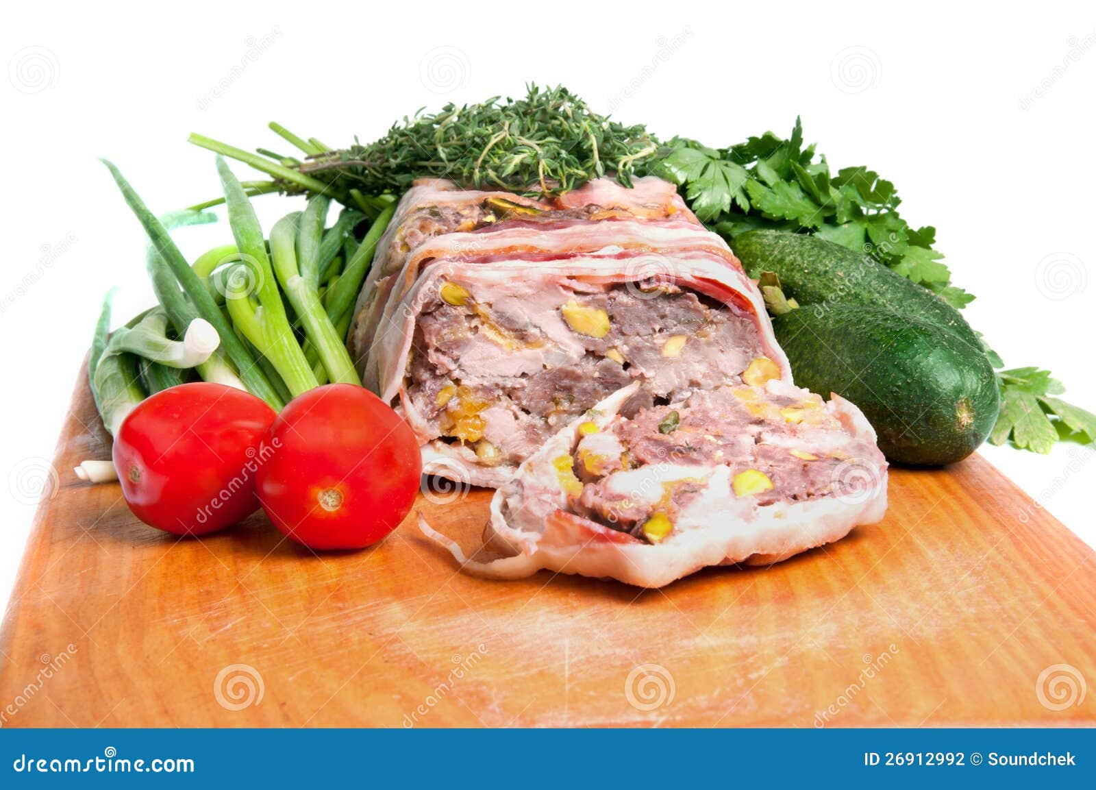 Terrine on a wooden board stock photo. Image of onion 26912992