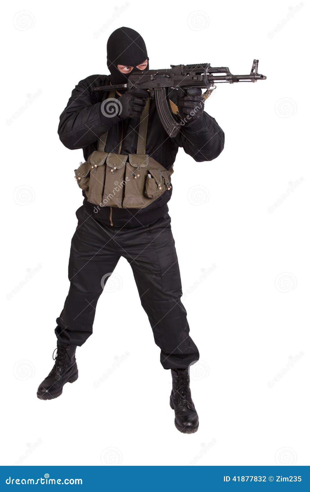 terrorist in black uniform and mask with kalashnikov 