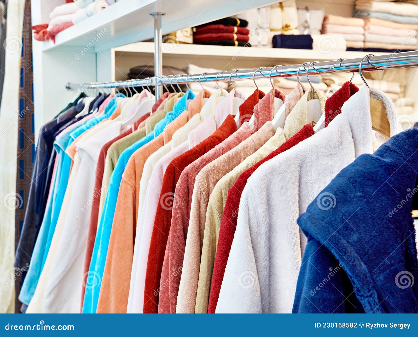 Terry bathrobes in store stock photo. Image of robe 230168582