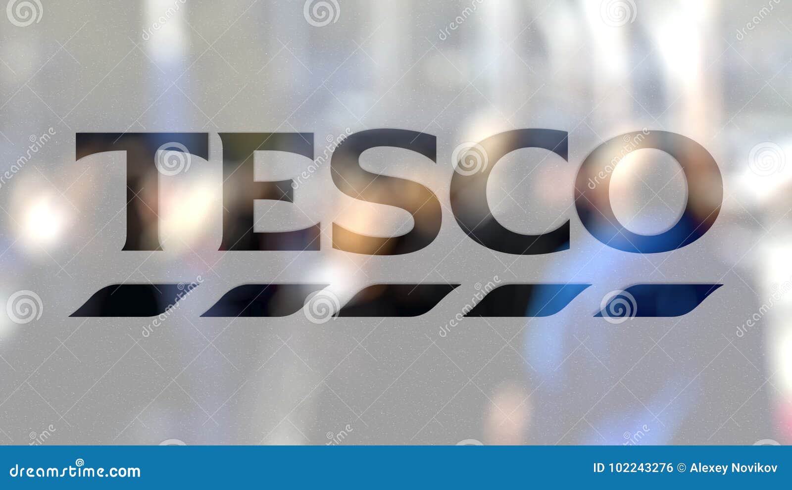 Tesco Logo on a Glass Against Blurred Crowd on the Steet. Editorial 3D