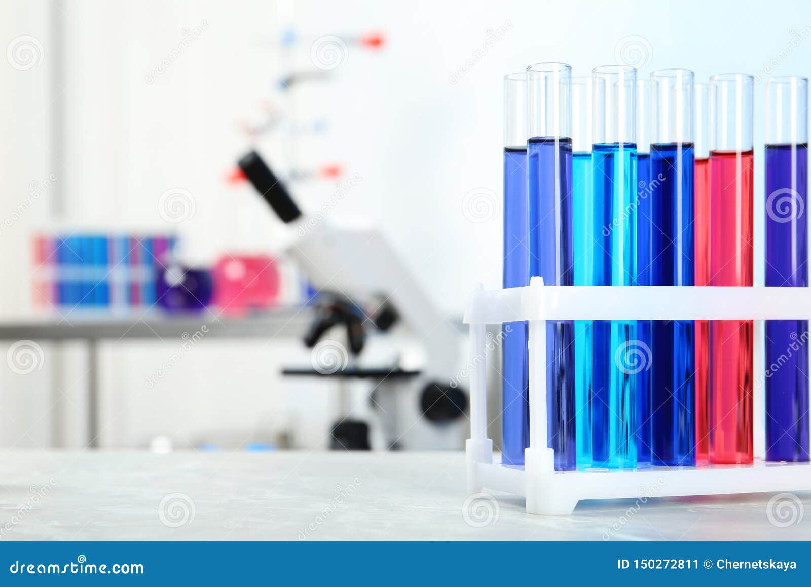 Test Tubes with Samples on Table in Chemistry Laboratory Stock Image