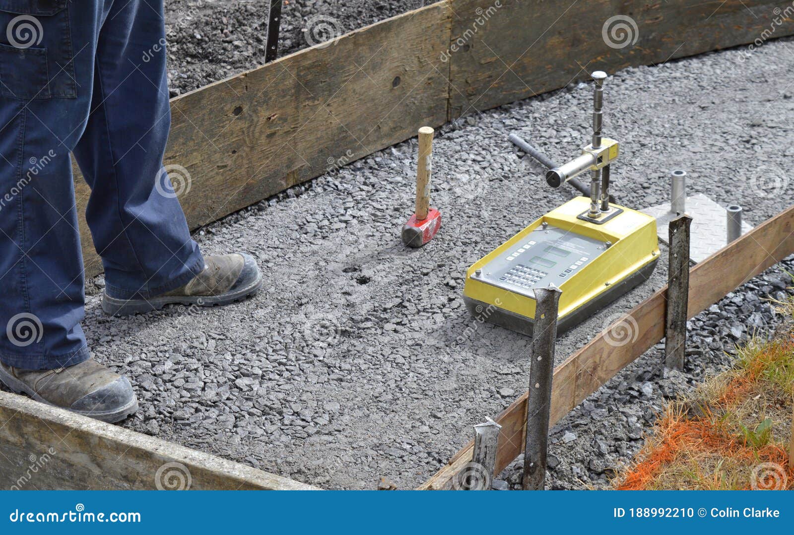 Testing the Compaction of a Newly Compressed Gravel Sidewalk Stock