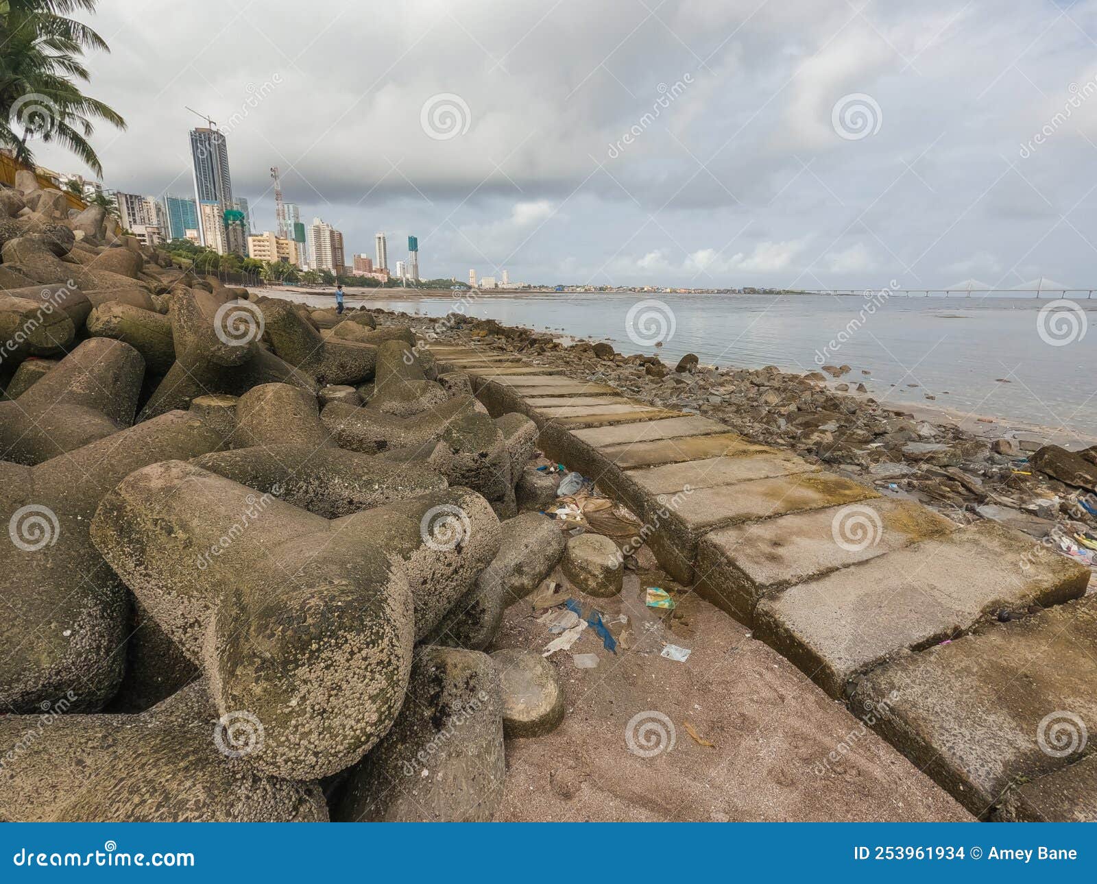 tetra pod rocks with a pathway near dadar chowpatty