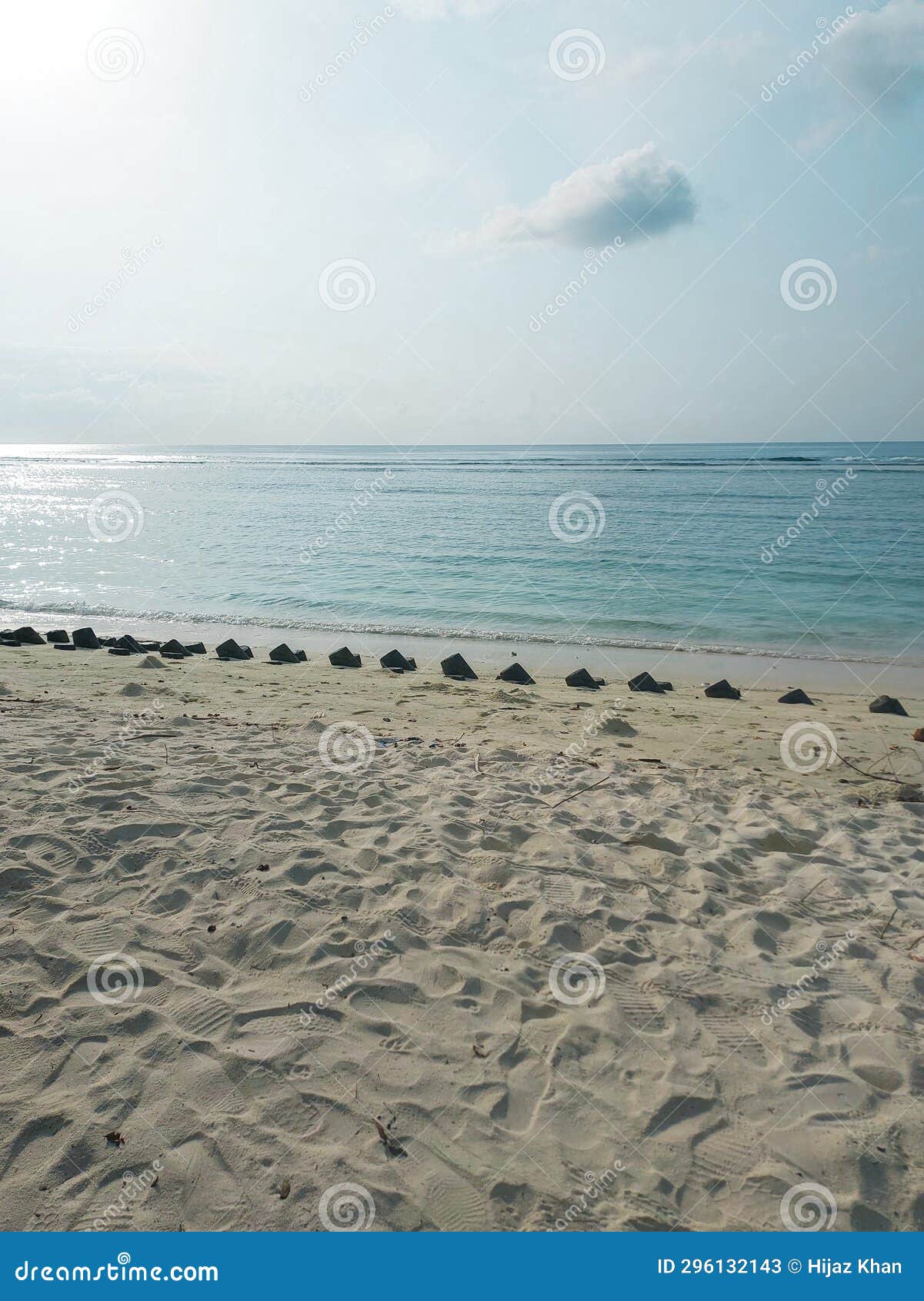 tetrapods submerged in the beach sand due sand washed to shore at agatti island lakshadweep