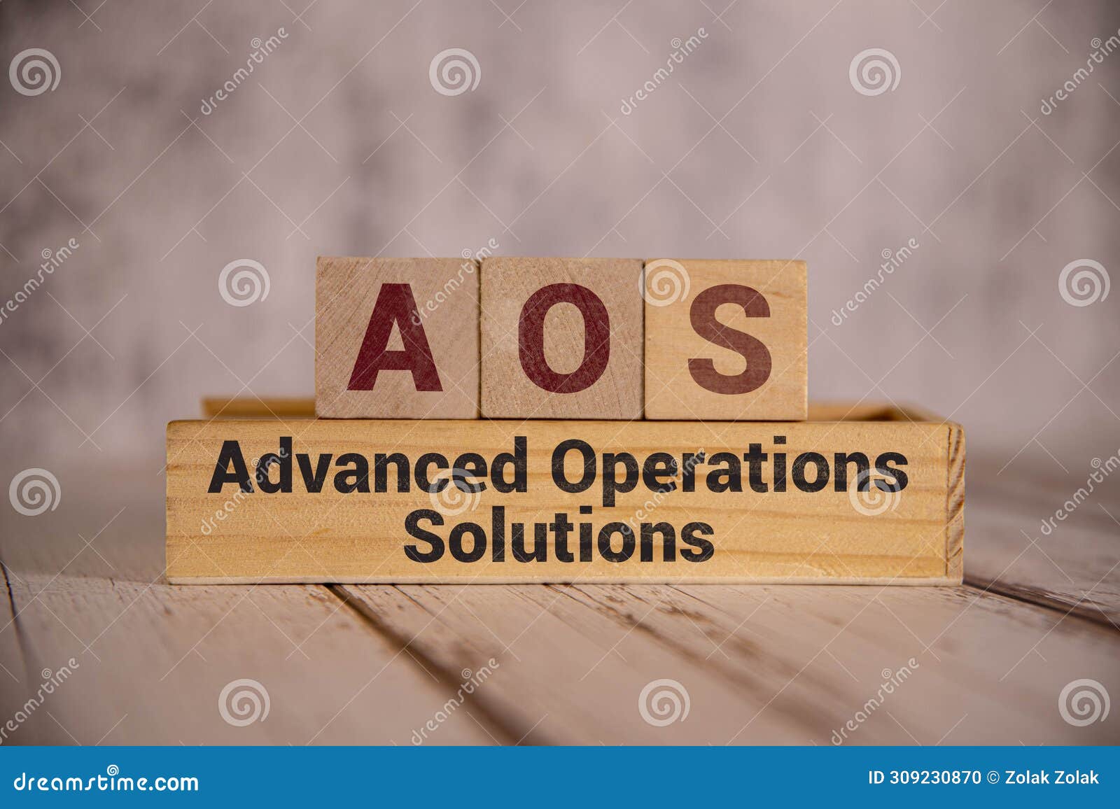 text advanced operations solutions - aos on wooden block