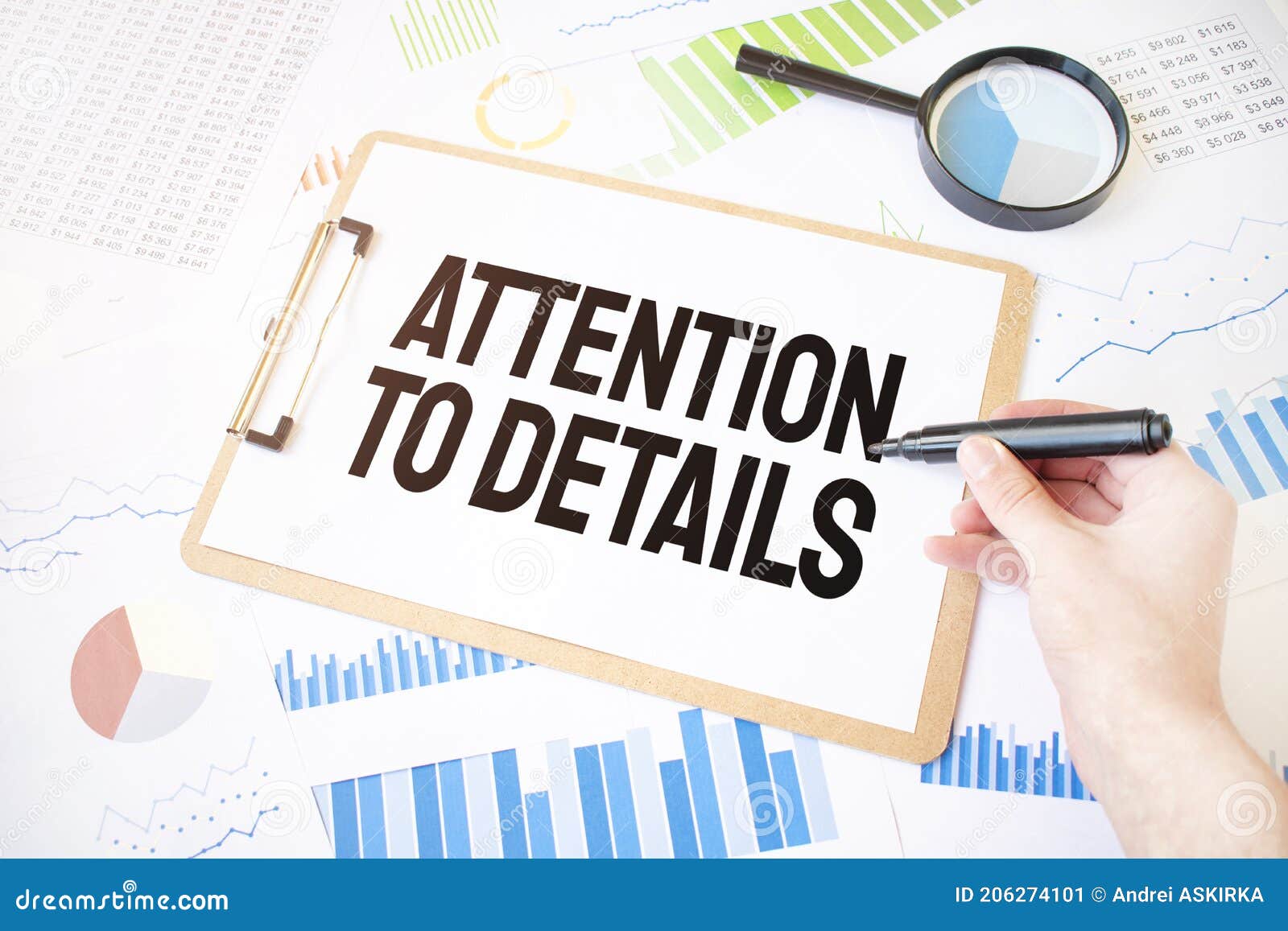 text attention to details on white paper sheet and marker on businessman hand on the diagram. business concept