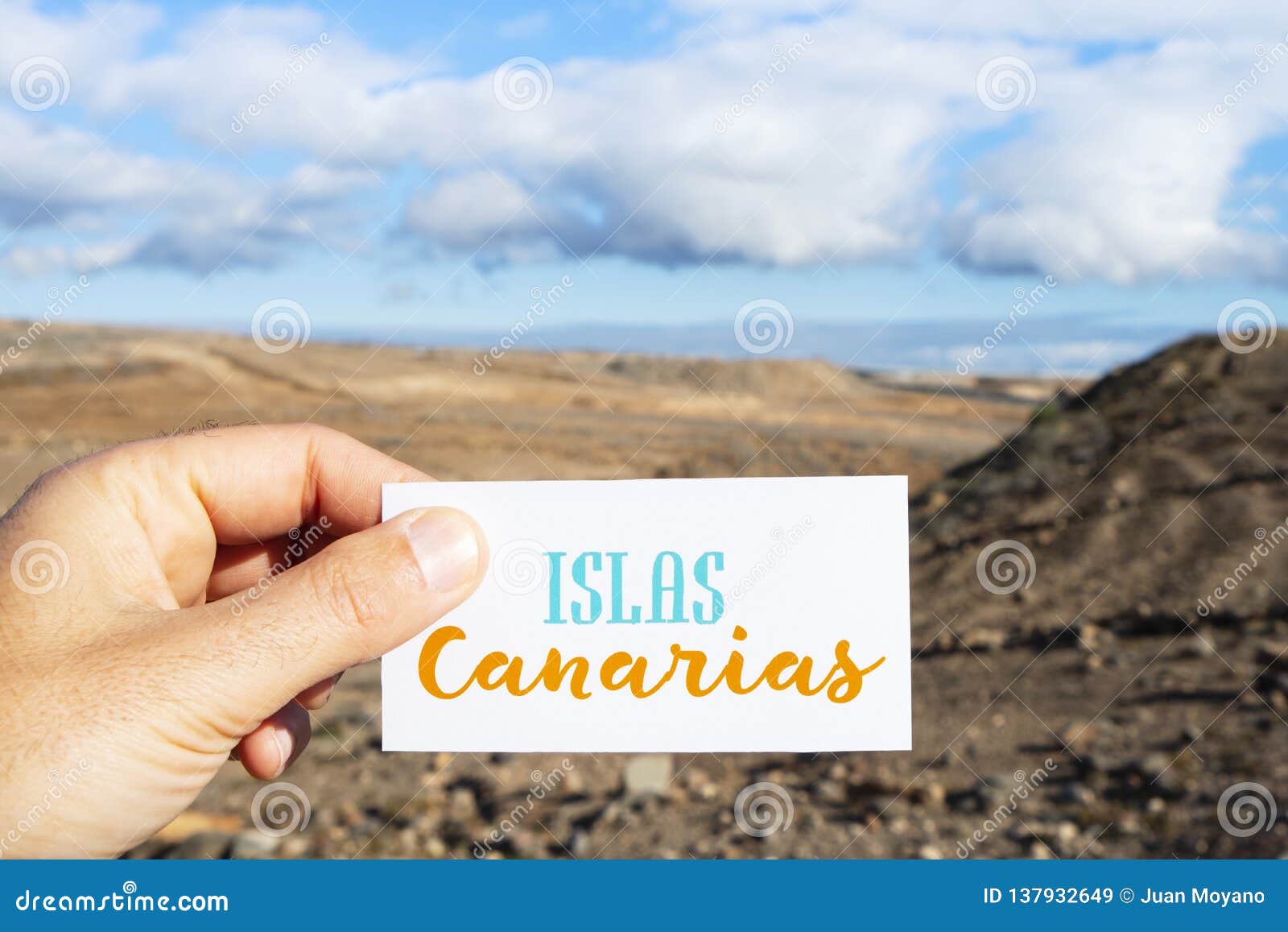 text canary islands in signboard in dry landscape