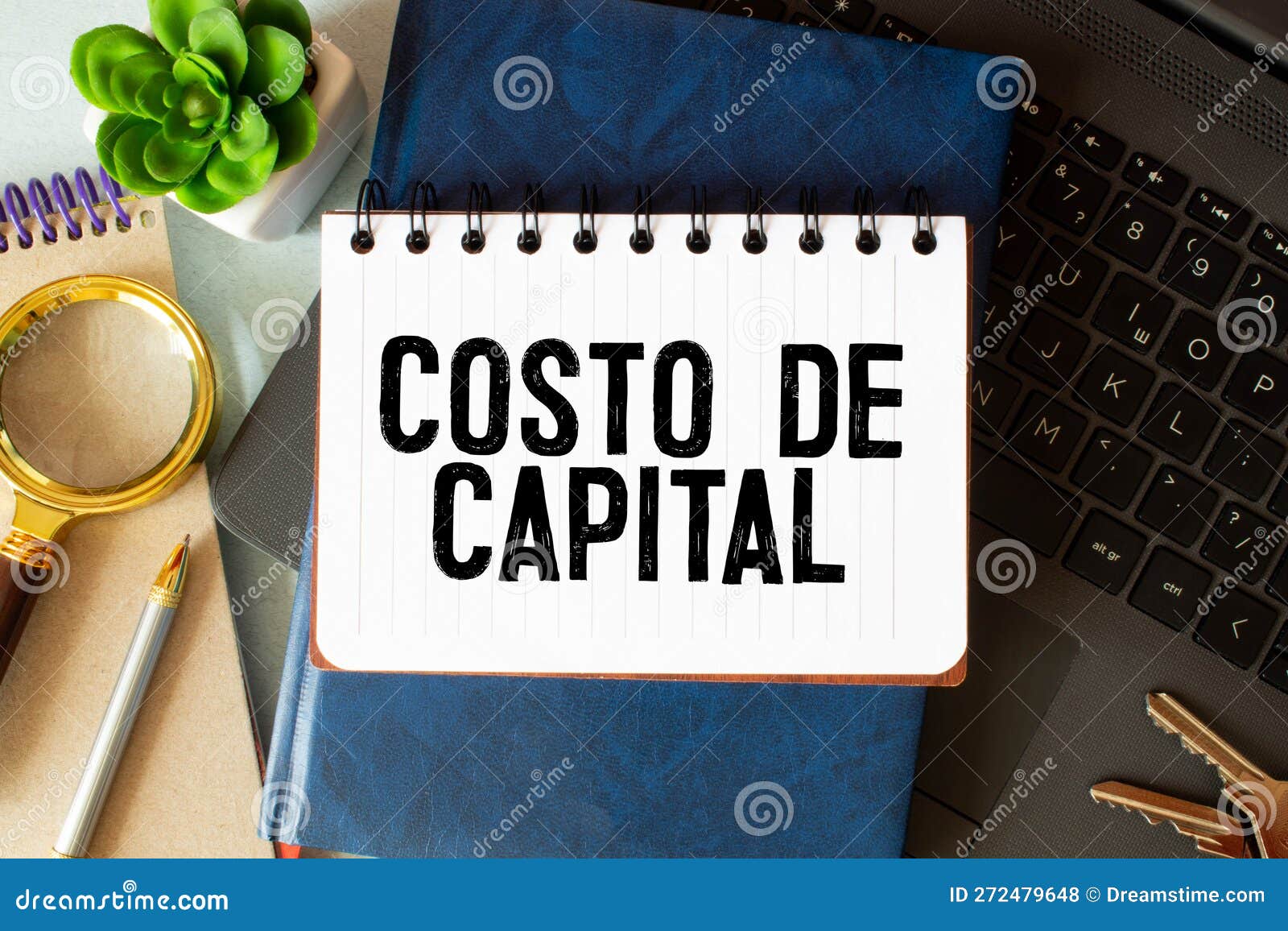 text costo de capital written on notebook with chart,calculator and dollars