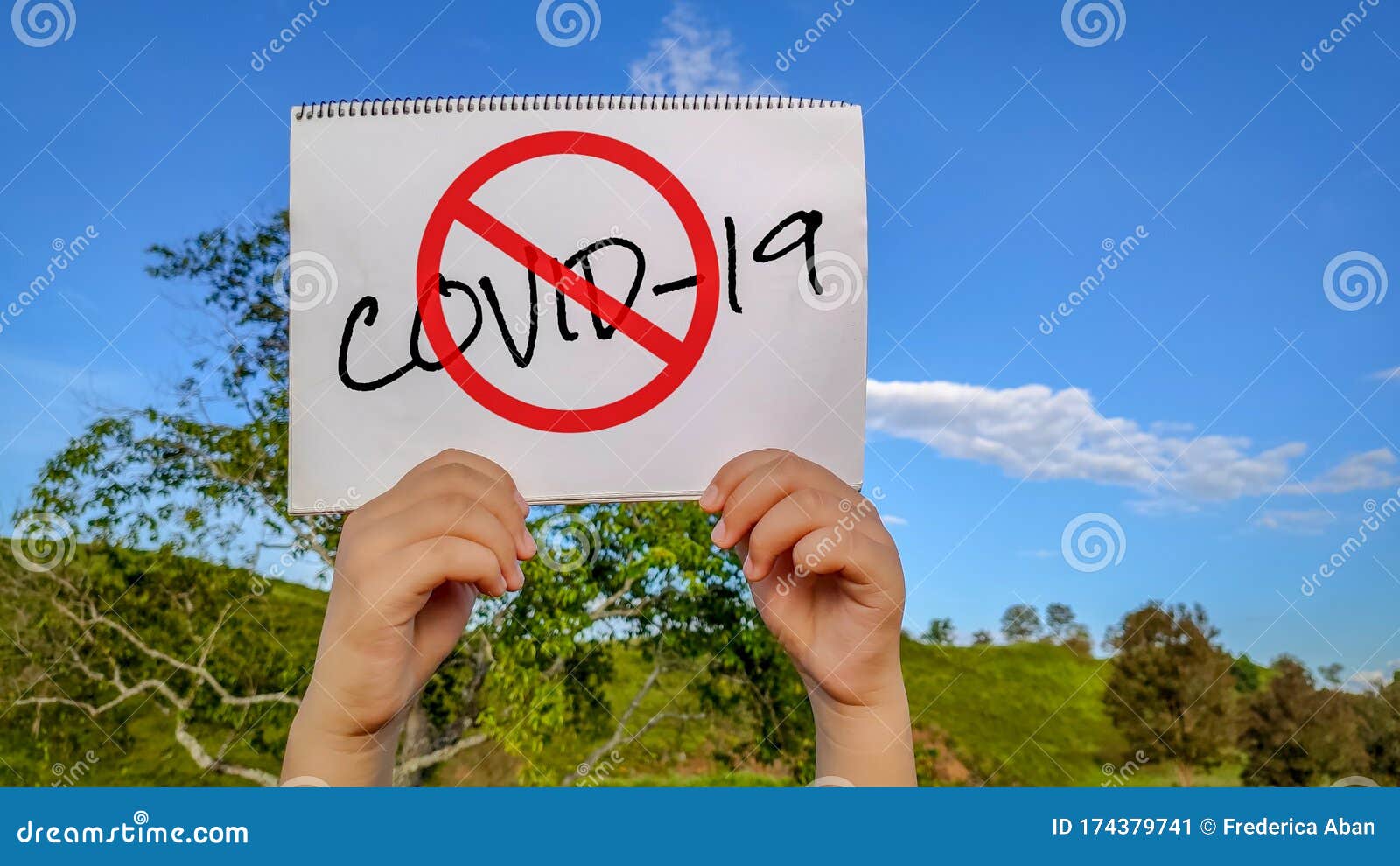text covid-19 with stop sign on notepad