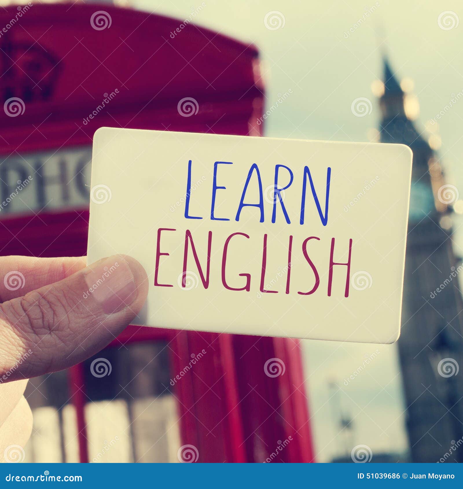 text learn english in a signboard with the big ben in the background, with a filter effect