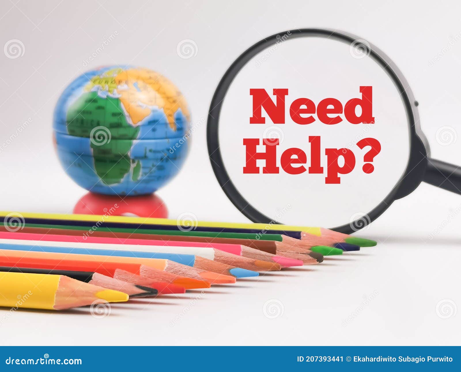 text need help with colorful pencils, a globe and magnifying glass   on white background.