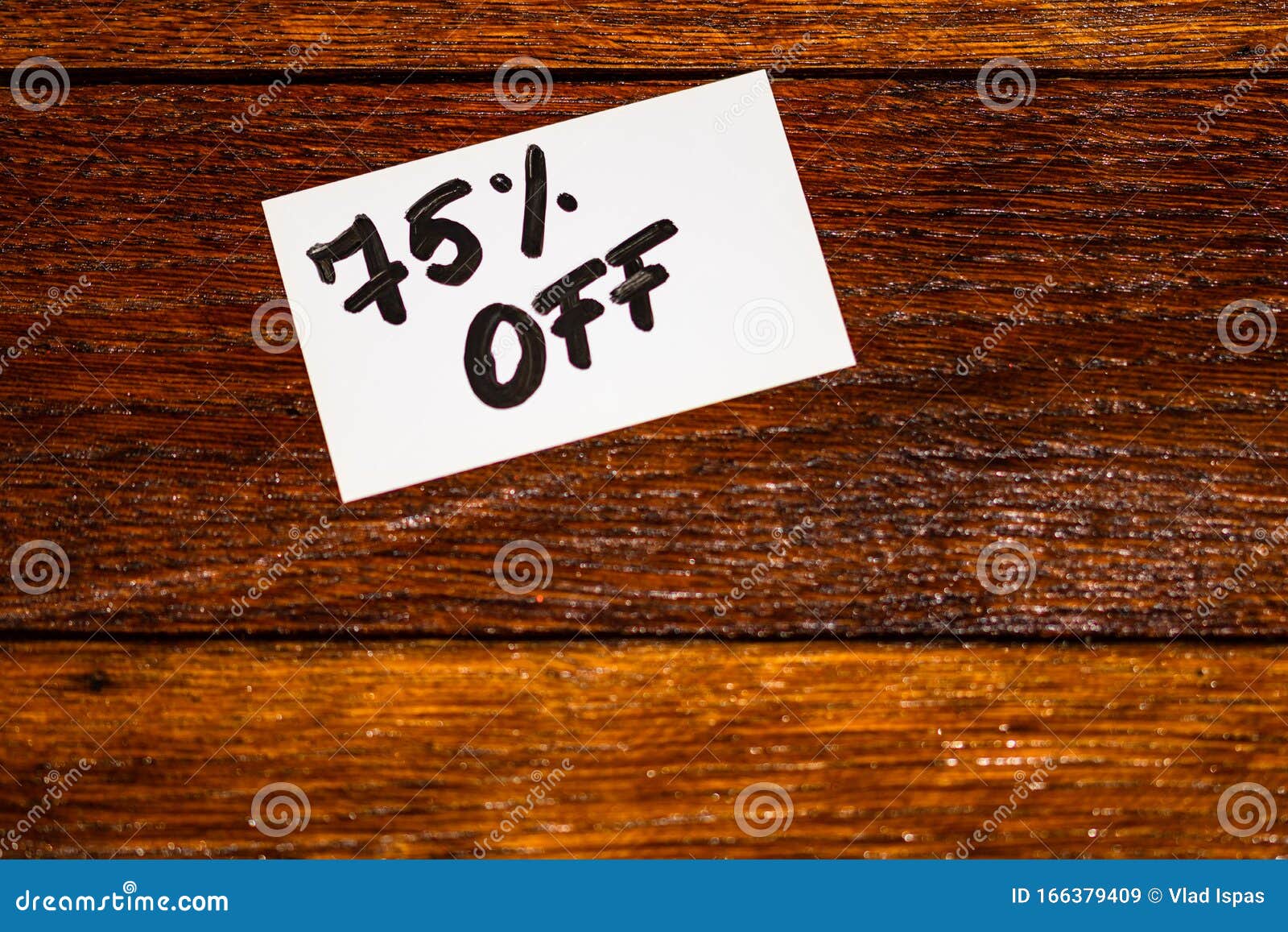 Text 75 Off on White Label. Label on Wooden Table, Close Up Stock Image ...