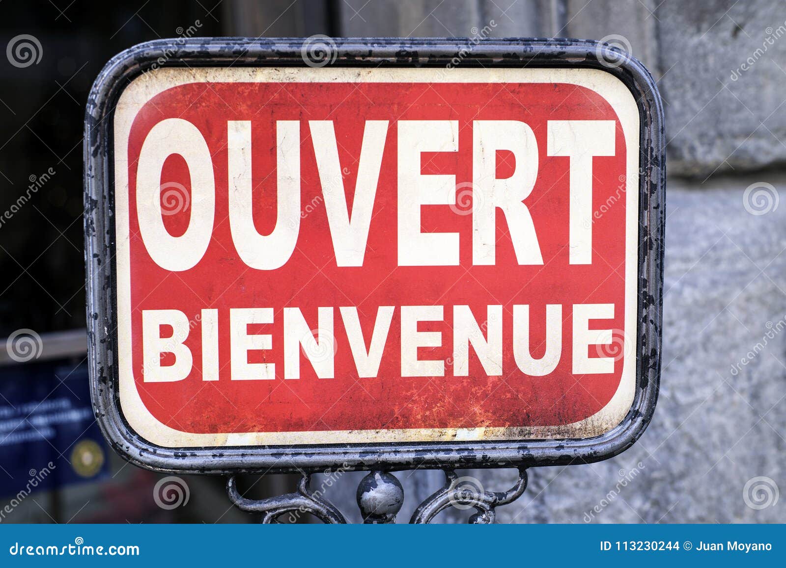 Outdoor Open Sign With Written In It In French Ouvert, Bienvenue Meaning  In English Open, Welcome. Stock Photo, Picture and Royalty Free Image.  Image 151867173.