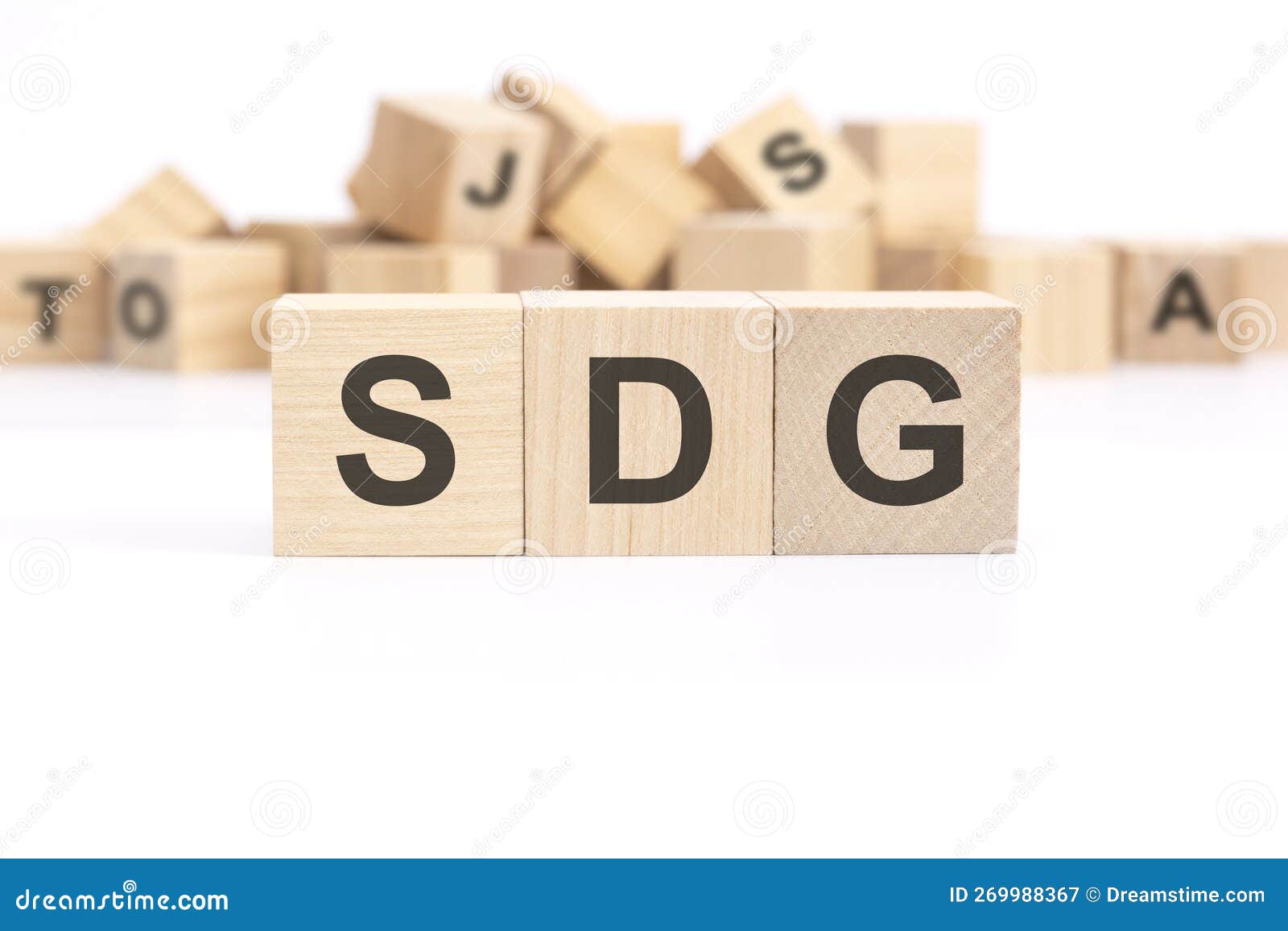 Text SDG Sustainable Development Goals is Written on Three Wooden