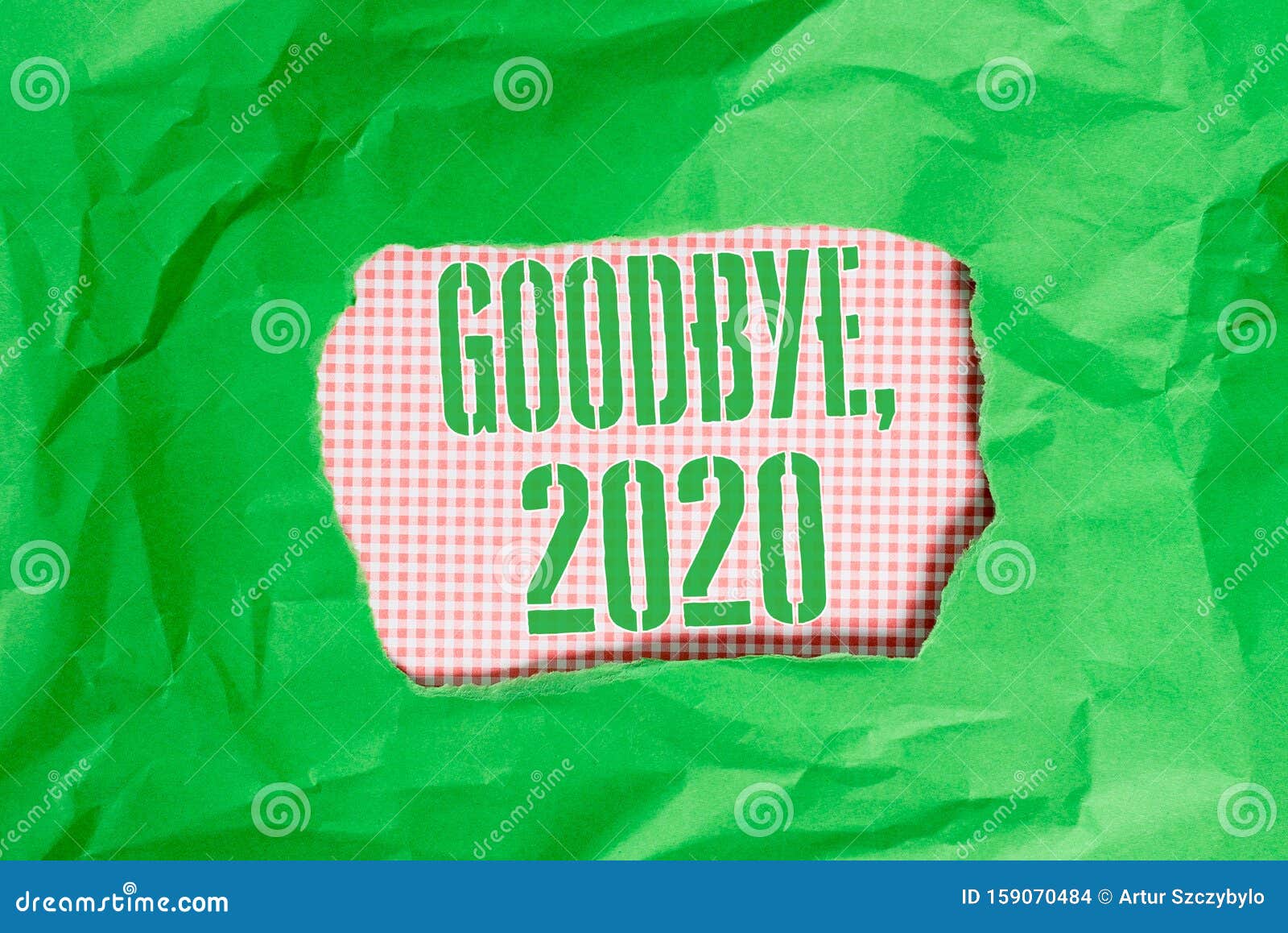 text sign showing goodbye 2020. conceptual photo new year eve milestone last month celebration transition green crumpled