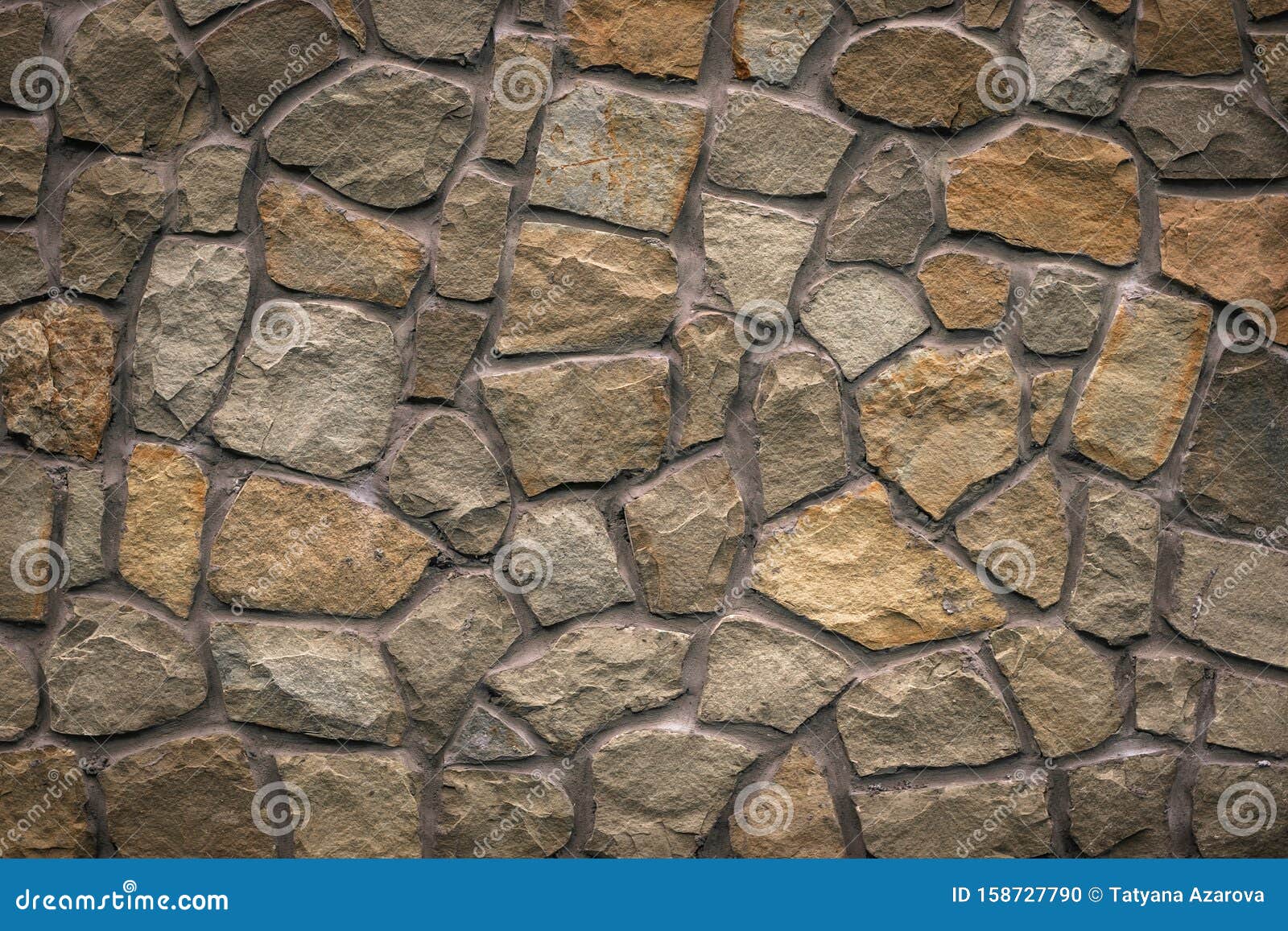 Um muro de pedra com um muro de pedra com textura de pedra.