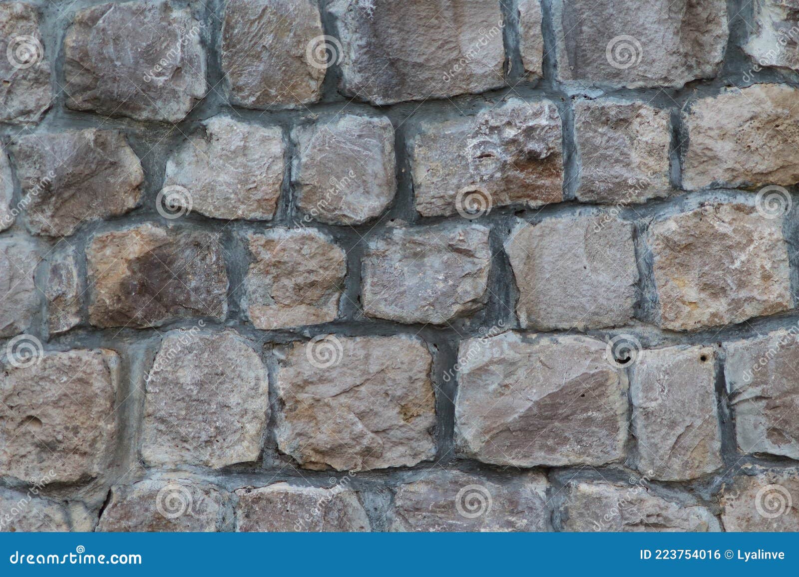 Um muro de pedra com um muro de pedra com textura de pedra.